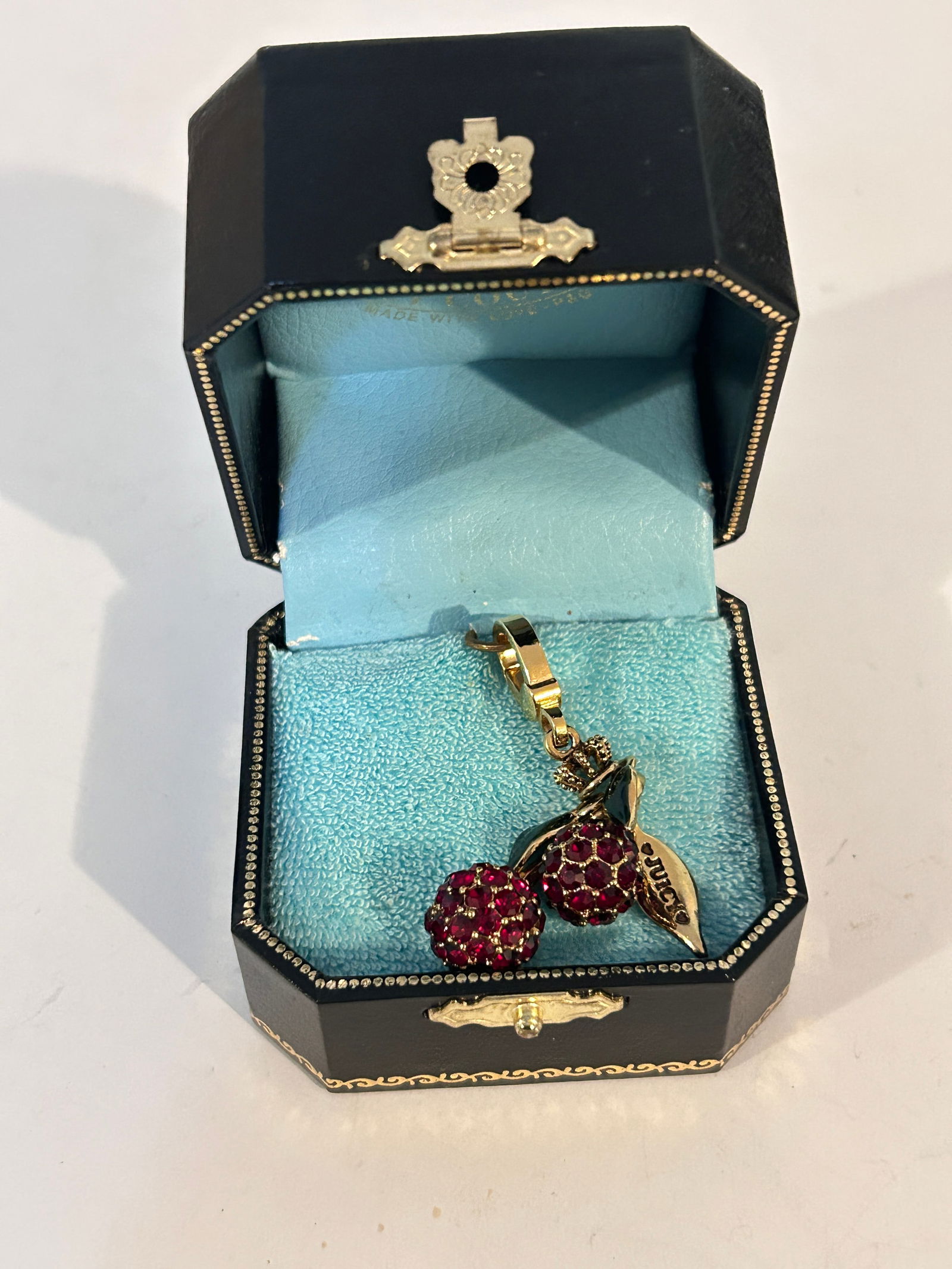 Juicy Couture Gold Tone Red Pave Crystal Cherries Charm pendant: Juicy Couture Gold Tone Red Pave Crystal Cherries Charm pendant Please view all photos as they are part of the description and condition of this Item, Feel free to contact me with questions or picture