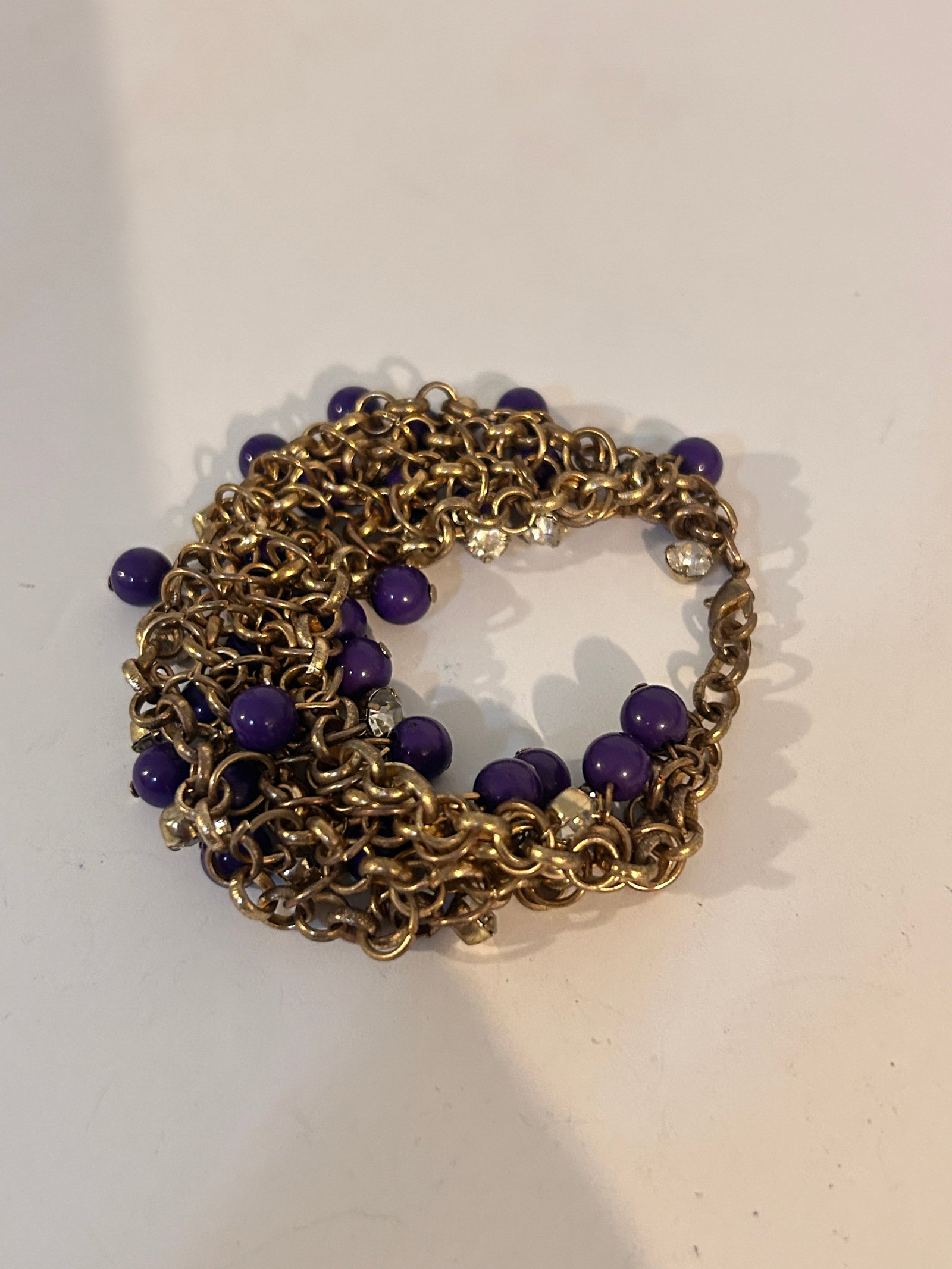 Vintage Goldtone purple bead Bracelet 7": Vintage Goldtone purple bead Bracelet 7" Please view all photos as they are part of the description and condition of this Item, Feel free to contact me with questions or picture requests! Used Item AS