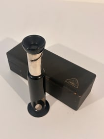 image is a wine vacuum pump, also known as a wine saver.