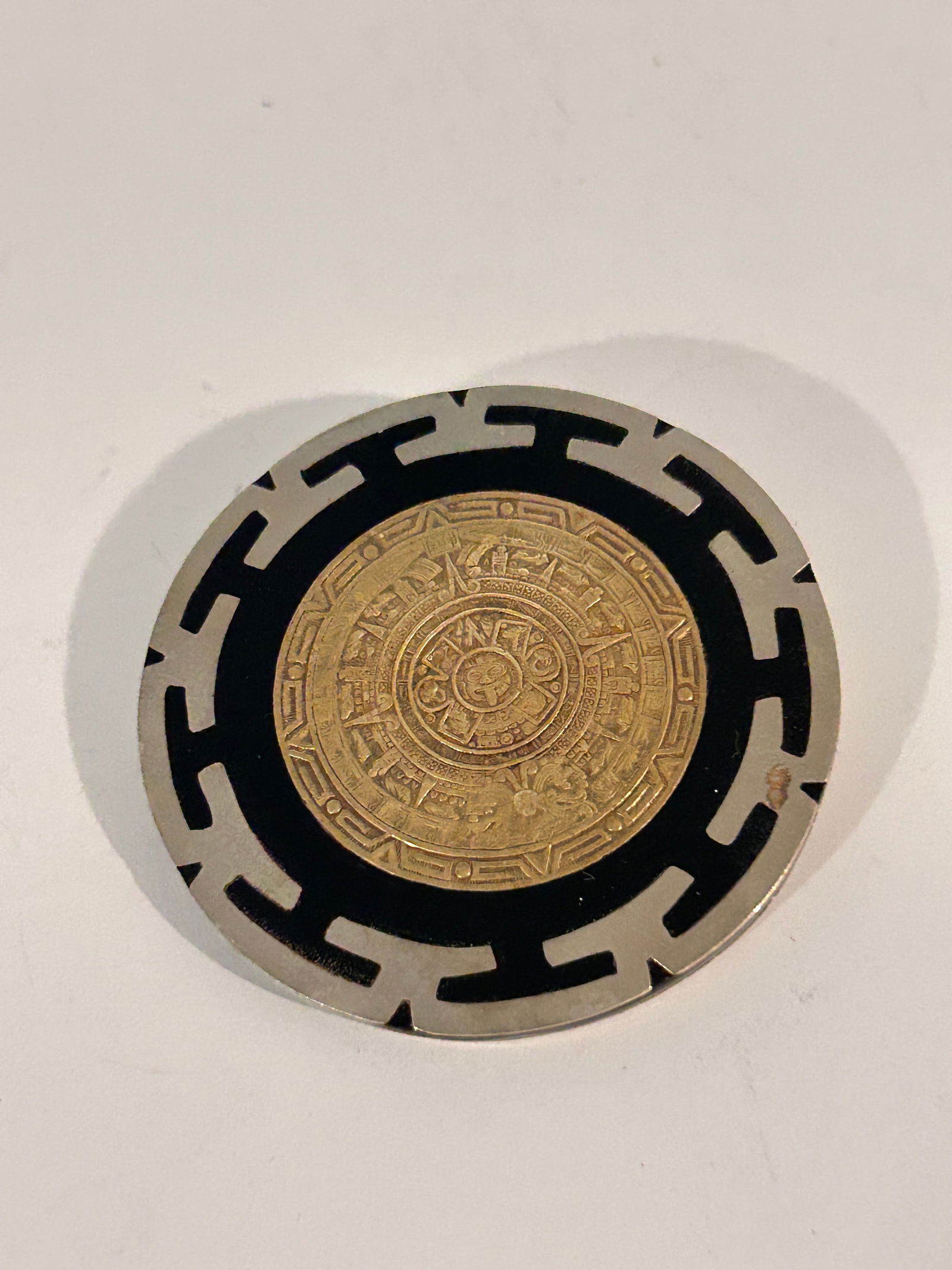 Vintage Brooch Aztec Calendar Alpaca With Brass Black Onyx Inlaid Mexico Pendant 2 1/4": Vintage Brooch Aztec Calendar Alpaca With Brass Black Onyx Inlaid Mexico Pendant 2 1/4" Please view all photos as they are part of the description and condition of this Item, Feel free to contact me w