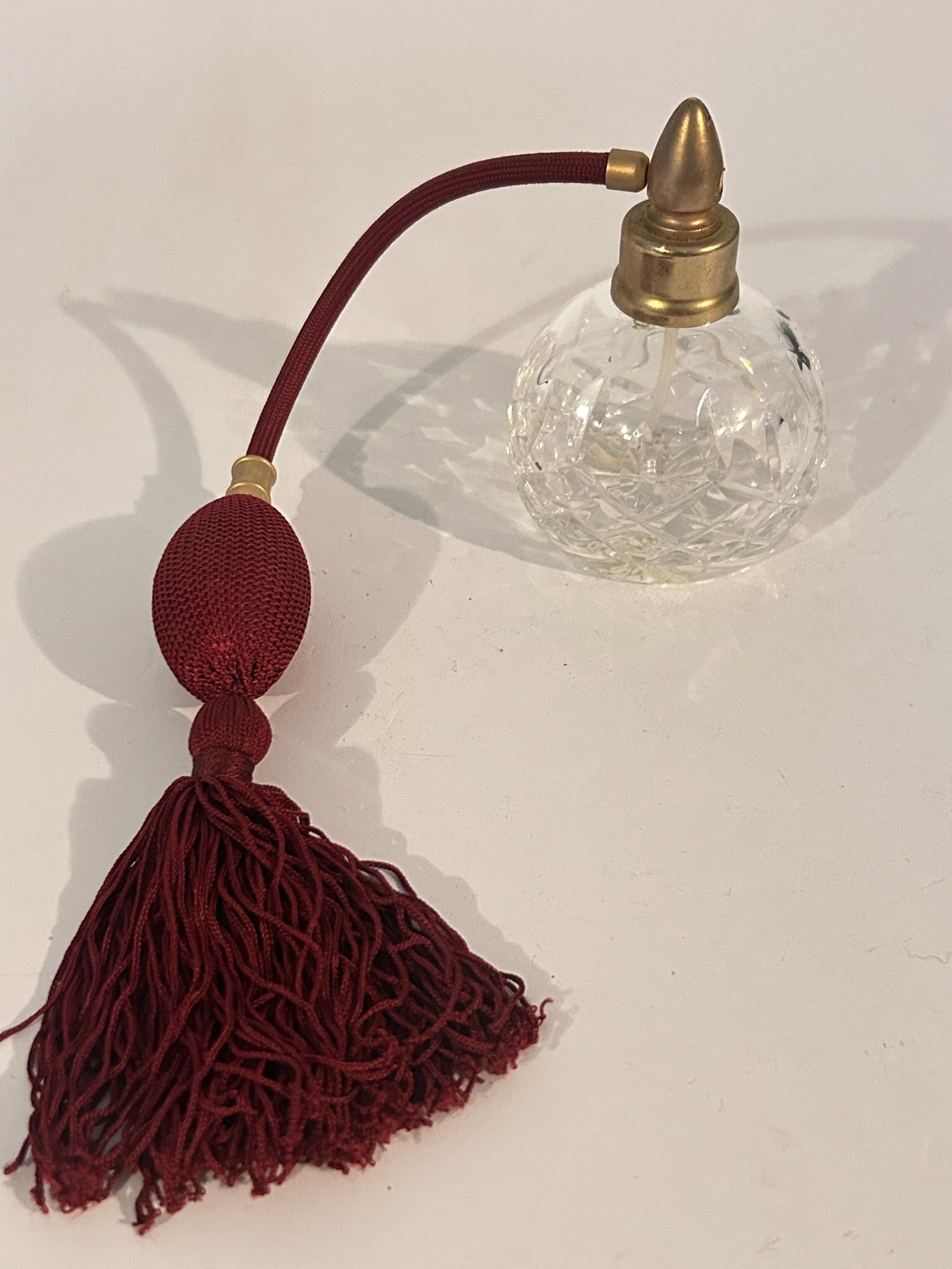 Waterford crystal perfume bottle with a red atomizer bulb and tassel: Waterford crystal perfume bottle with a red atomizer bulb and tassel Please view all photos as they are part of the description and condition of this Item, Feel free to contact me with questions or pi