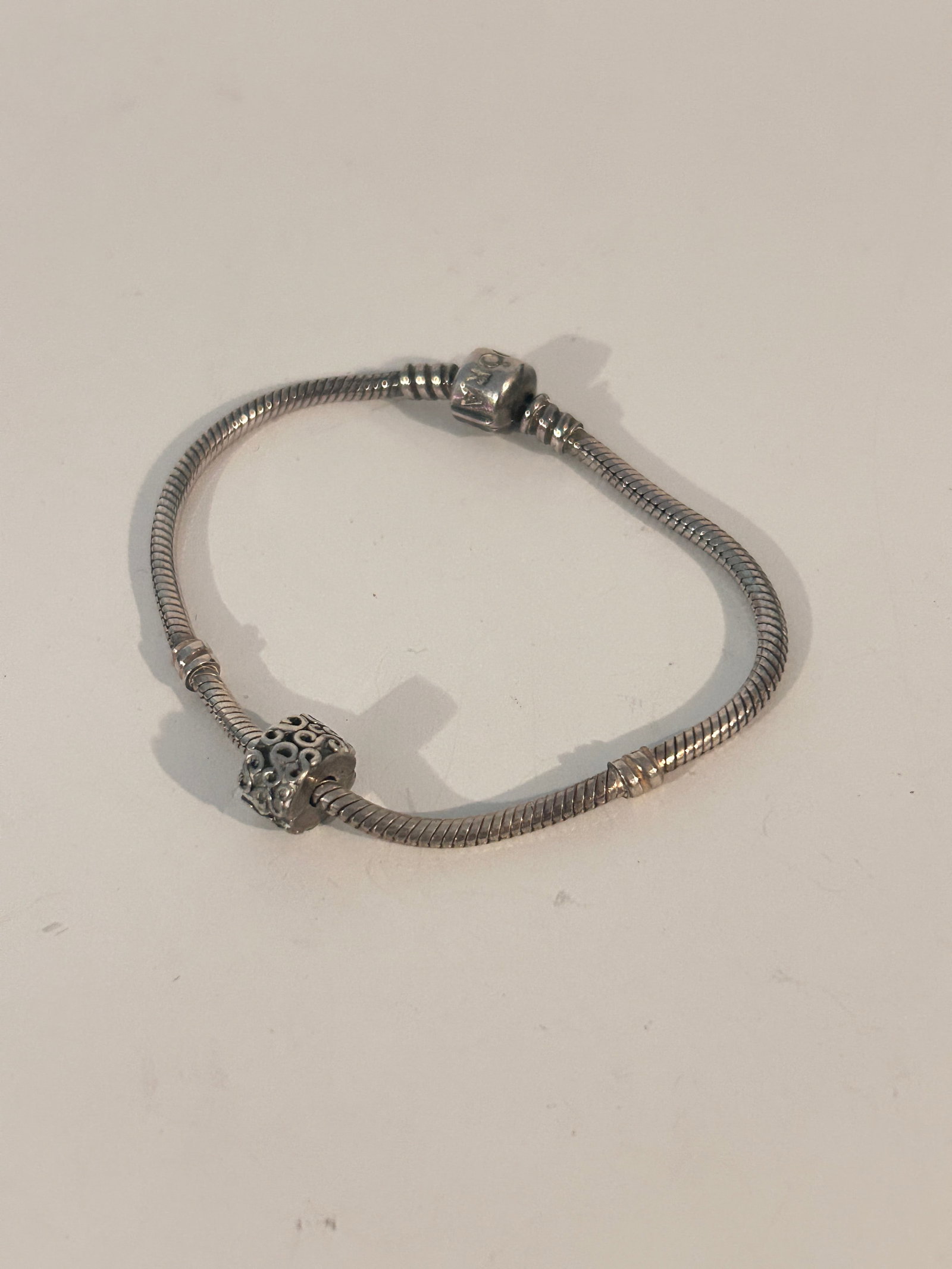 Vintage Pandora Sterling Silver Pandora 925 Bracelet 7 1/2": Vintage Pandora Sterling Silver Pandora 925 Bracelet 7 1/2" Please view all photos as they are part of the description and condition of this Item, Feel free to contact me with questions or picture req