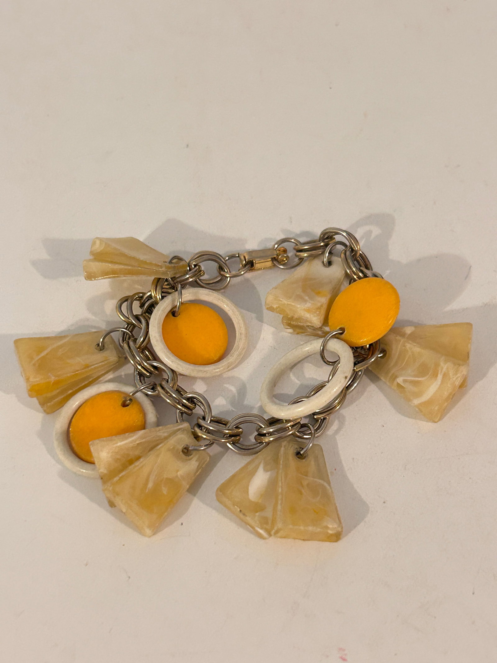Vintage Acylic bead charm Bracelet 7": Vintage Acylic bead charm Bracelet 7" Please view all photos as they are part of the description and condition of this Item, Feel free to contact me with questions or picture requests! Used Item AS IS