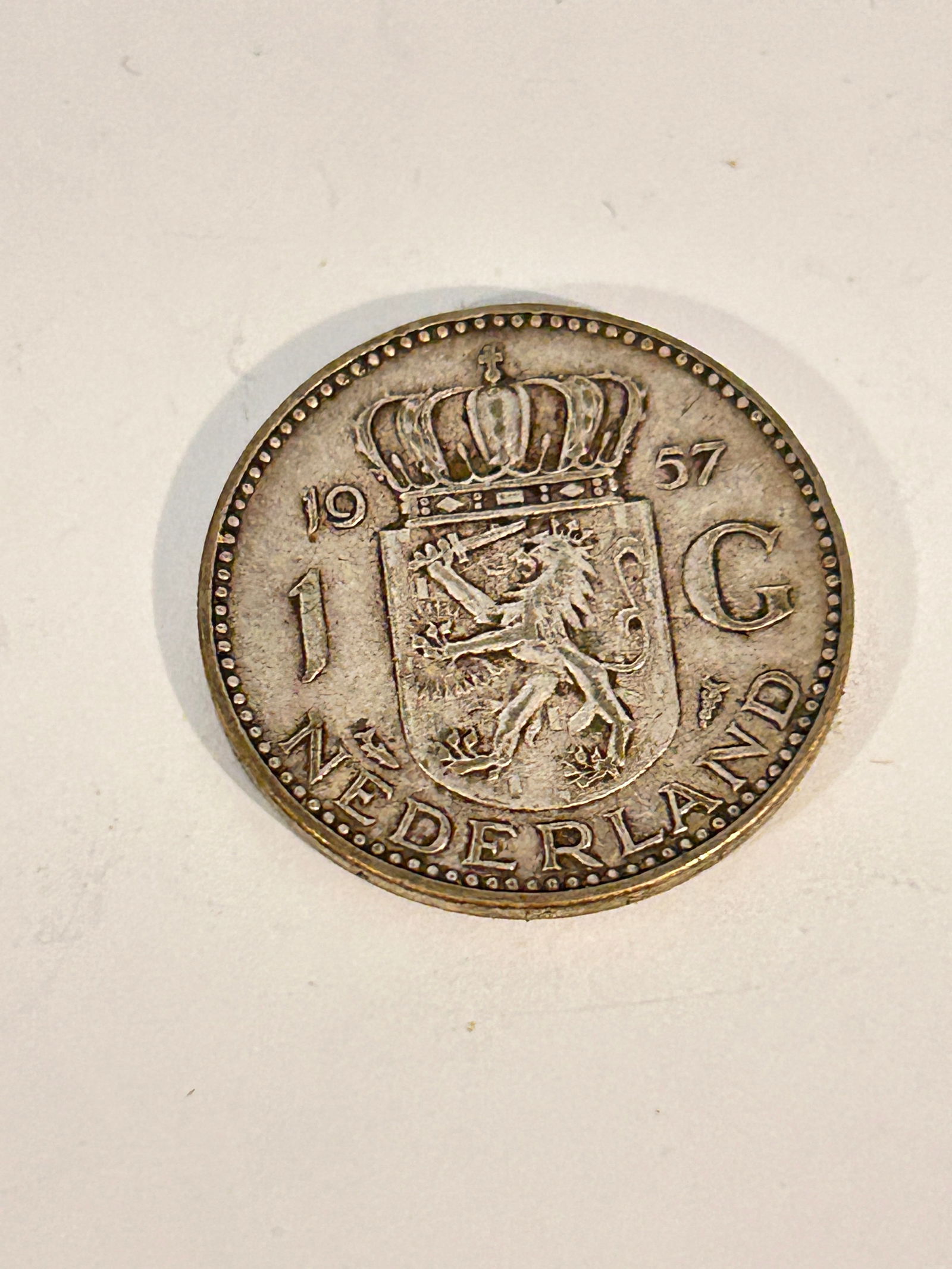 Netherlands 1957 1 Gulden Silver Coin: Netherlands 1957 1 Gulden Silver Coin Please view all photos as they are part of the description and condition of this Item, Feel free to contact me with questions or picture requests! Used Item AS IS