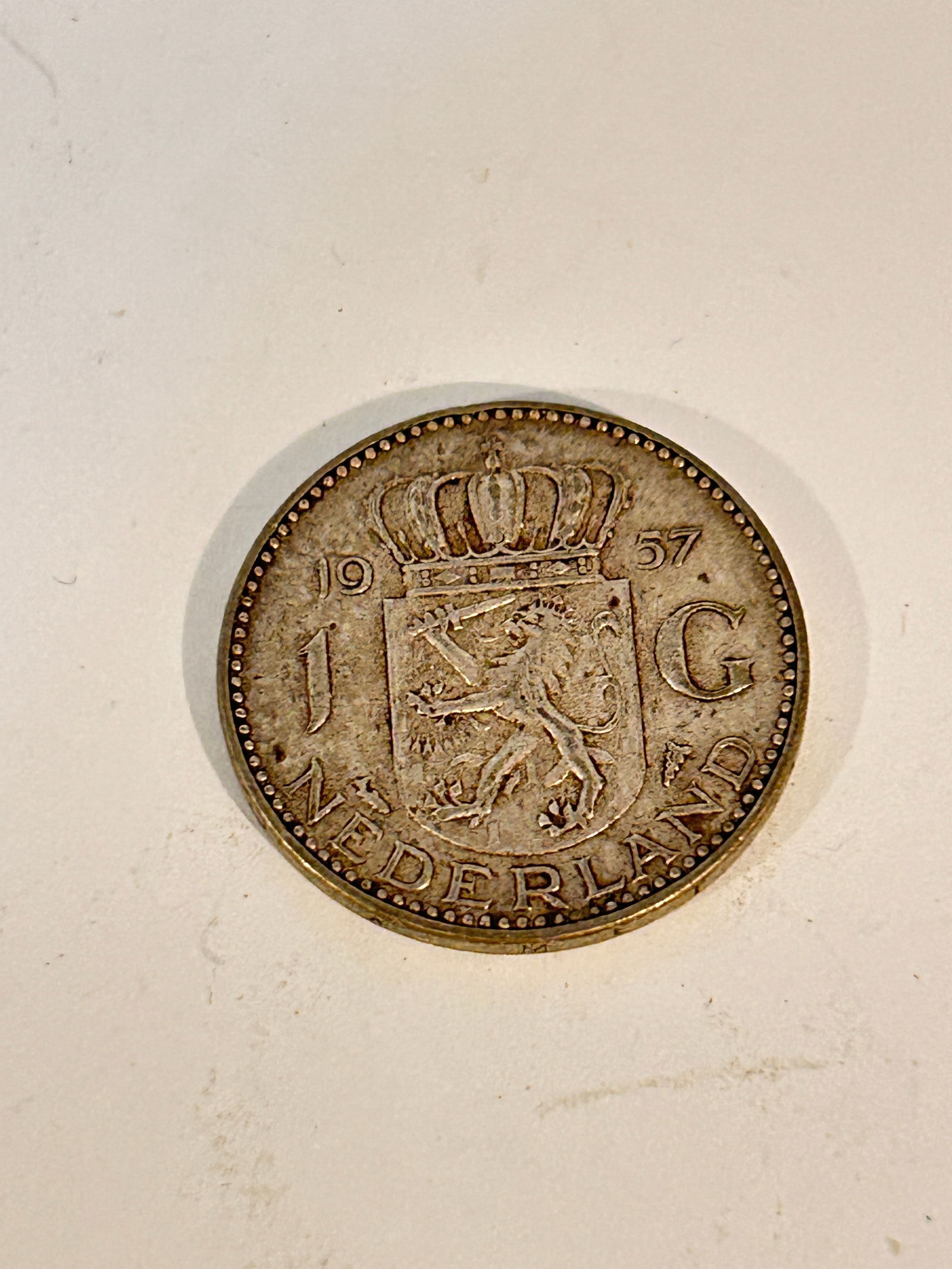 Netherlands 1957 1 Gulden Silver Coin: Netherlands 1957 1 Gulden Silver Coin Please view all photos as they are part of the description and condition of this Item, Feel free to contact me with questions or picture requests! Used Item AS IS