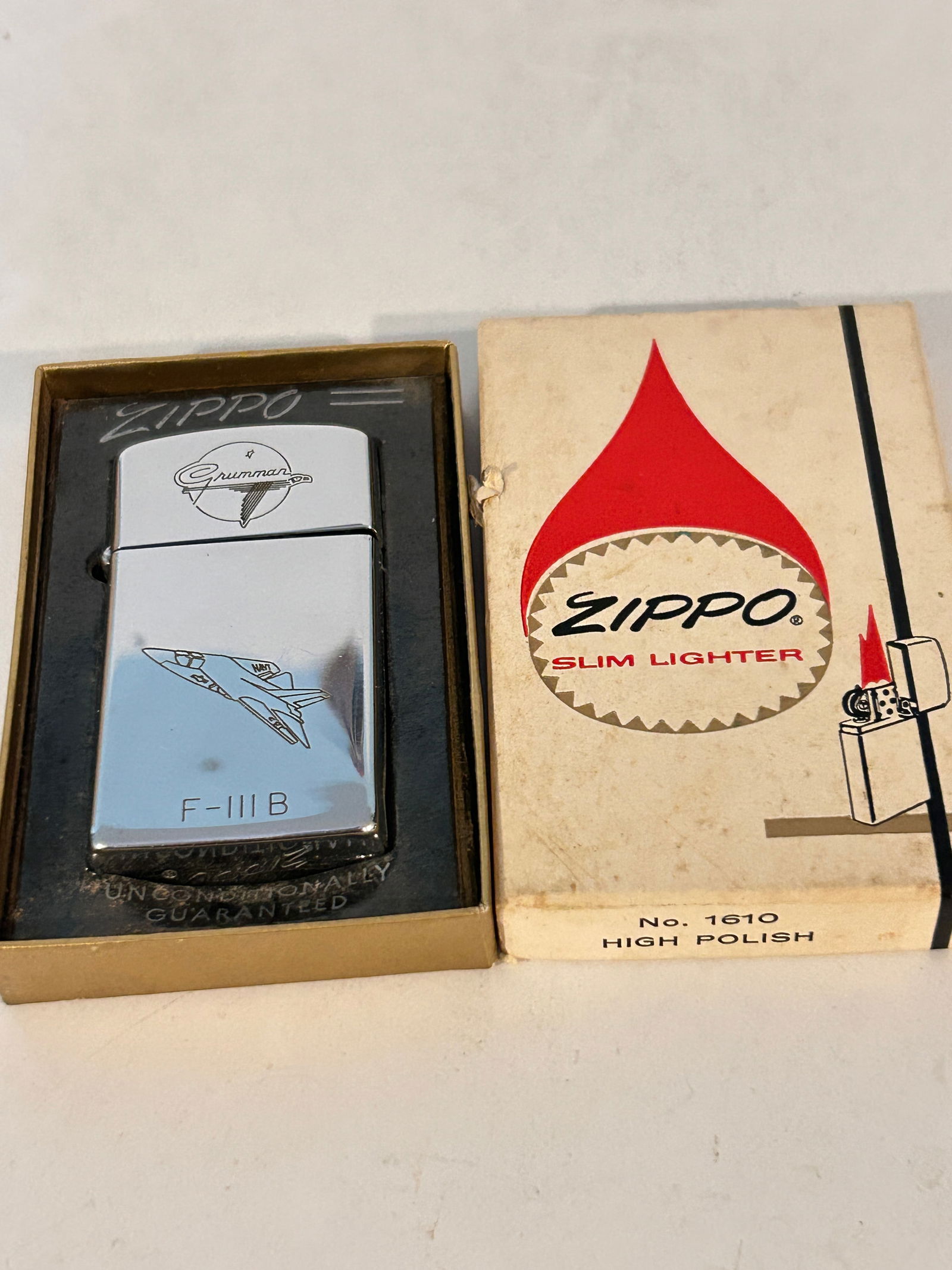Vintage 1960's Zippo Slim Lighter #1610 High Polish Grumman F111 (1 of 6)
