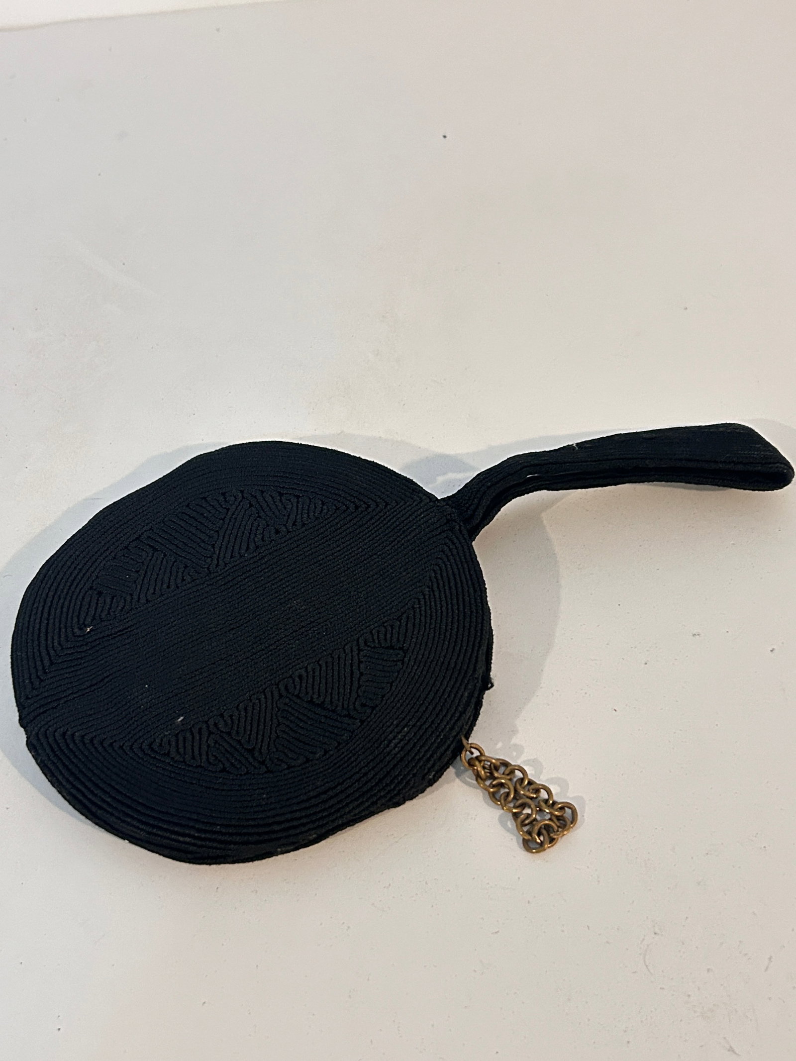 vintage black corde wristlet purse.: vintage black corde wristlet purse. Please view all photos as they are part of the description and condition of this Item, Feel free to contact me with questions or picture requests! Used Item AS IS