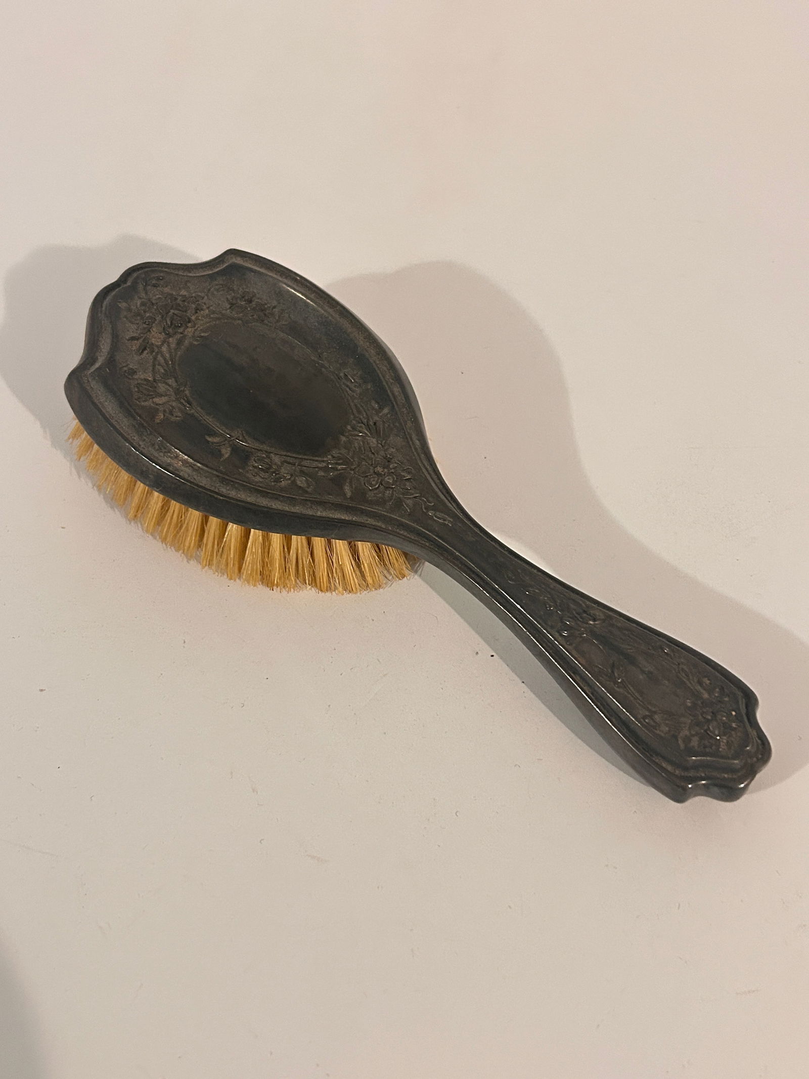 antique Art Nouveau-style hairbrush. (1 of 4)