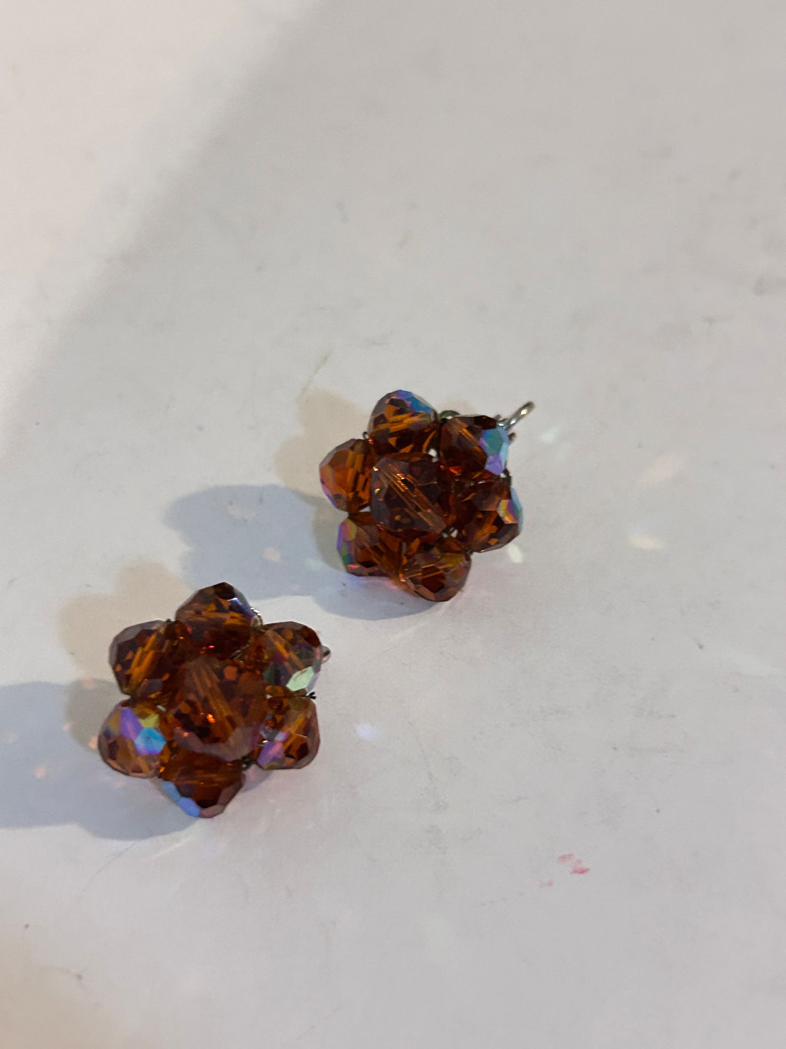 vintage crystal cluster earrings in a topaz or root beer color: vintage crystal cluster earrings in a topaz or root beer color Please view all photos as they are part of the description and condition of this Item, Feel free to contact me with questions or picture