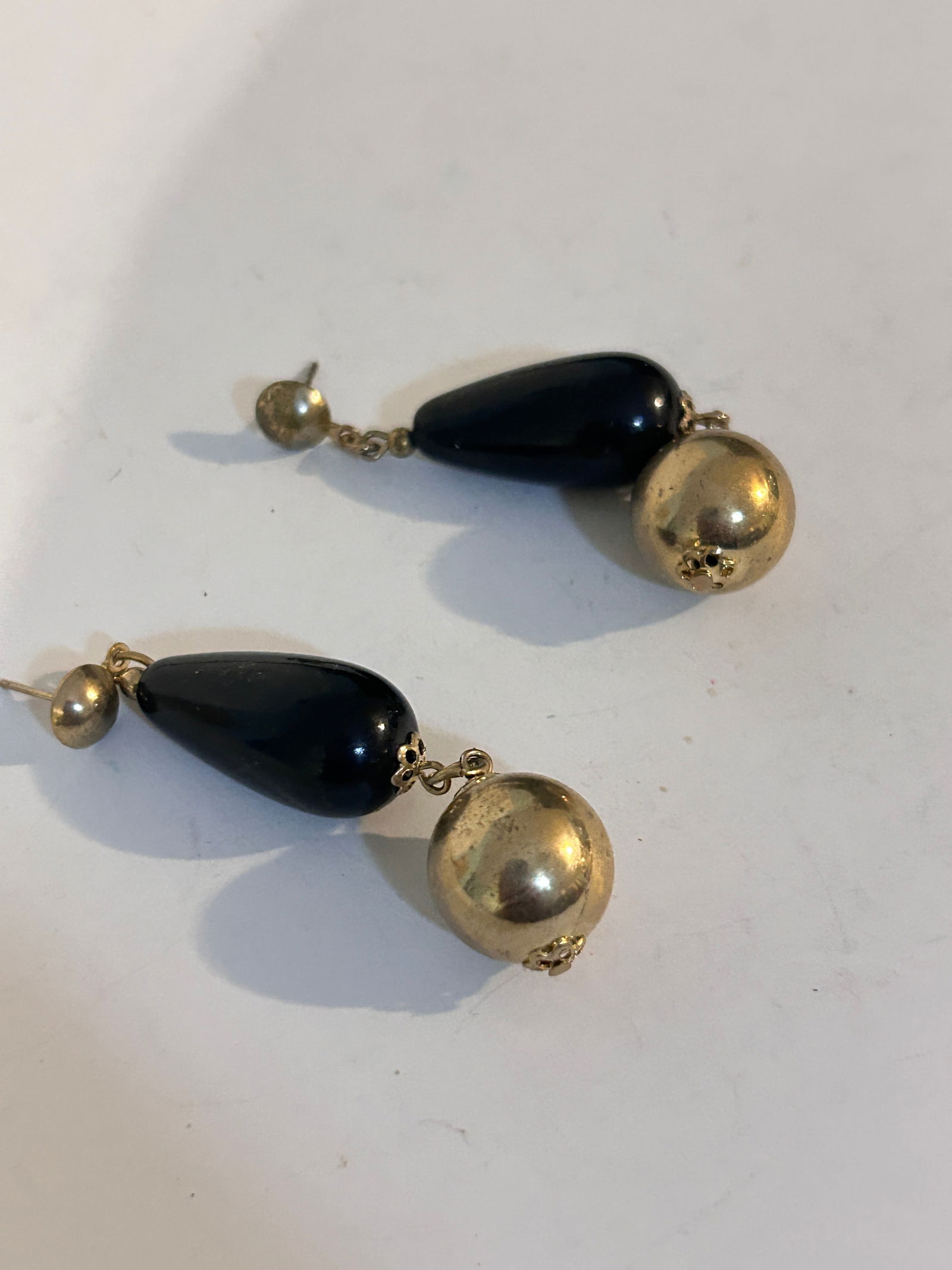 black gold-tone dangle earrings with a round metal bead no backs (1 of 3)
