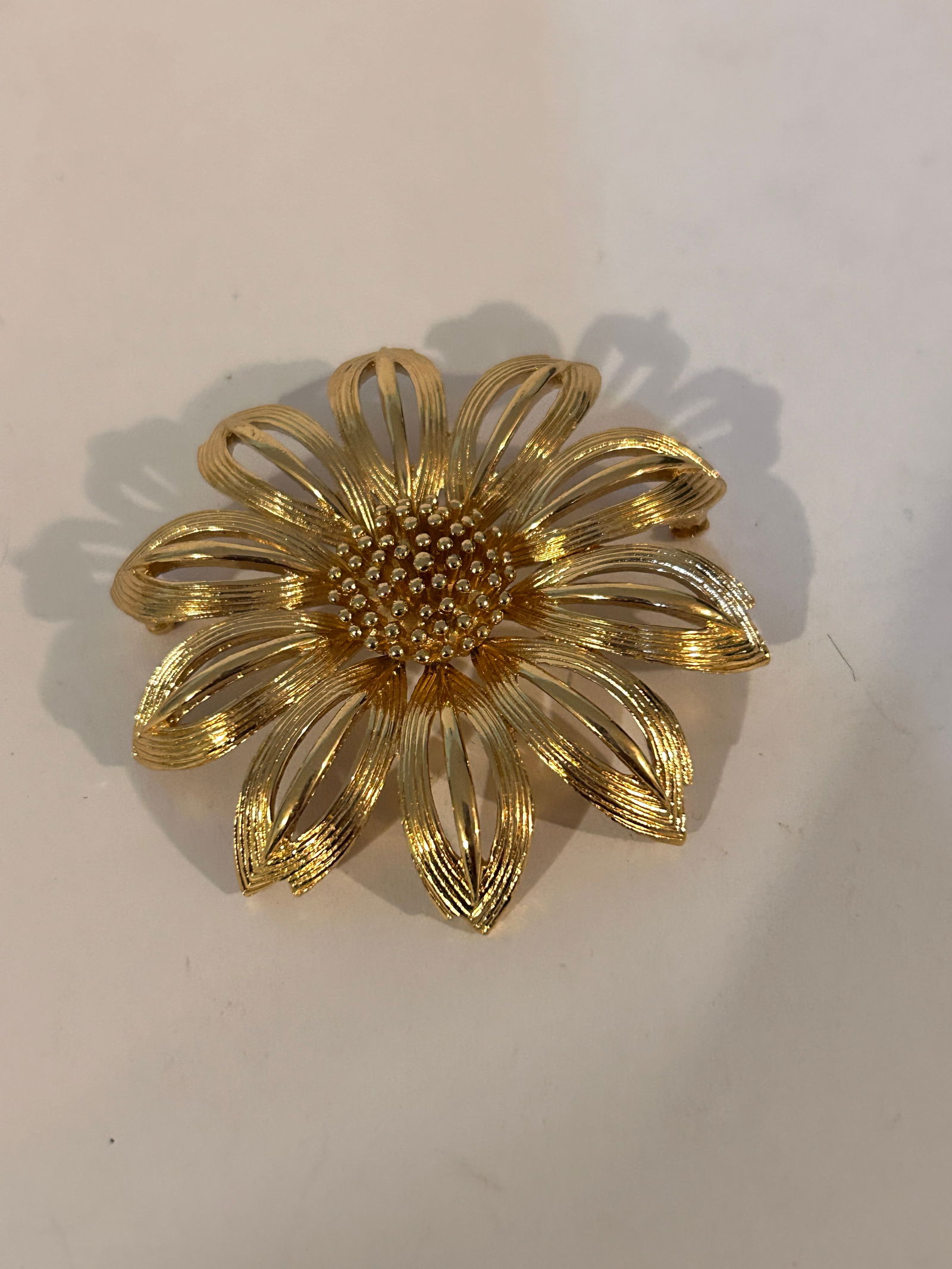Vintage gold tone Monet Brooch (1 of 5)