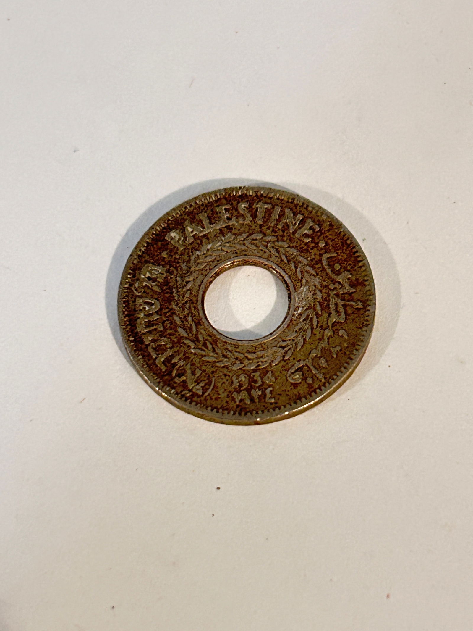 5 Mill Palestine 1934 coin: 5 Mill Palestine 1934 coin Please view all photos as they are part of the description and condition of this Item, Feel free to contact me with questions or picture requests! Used Item AS IS