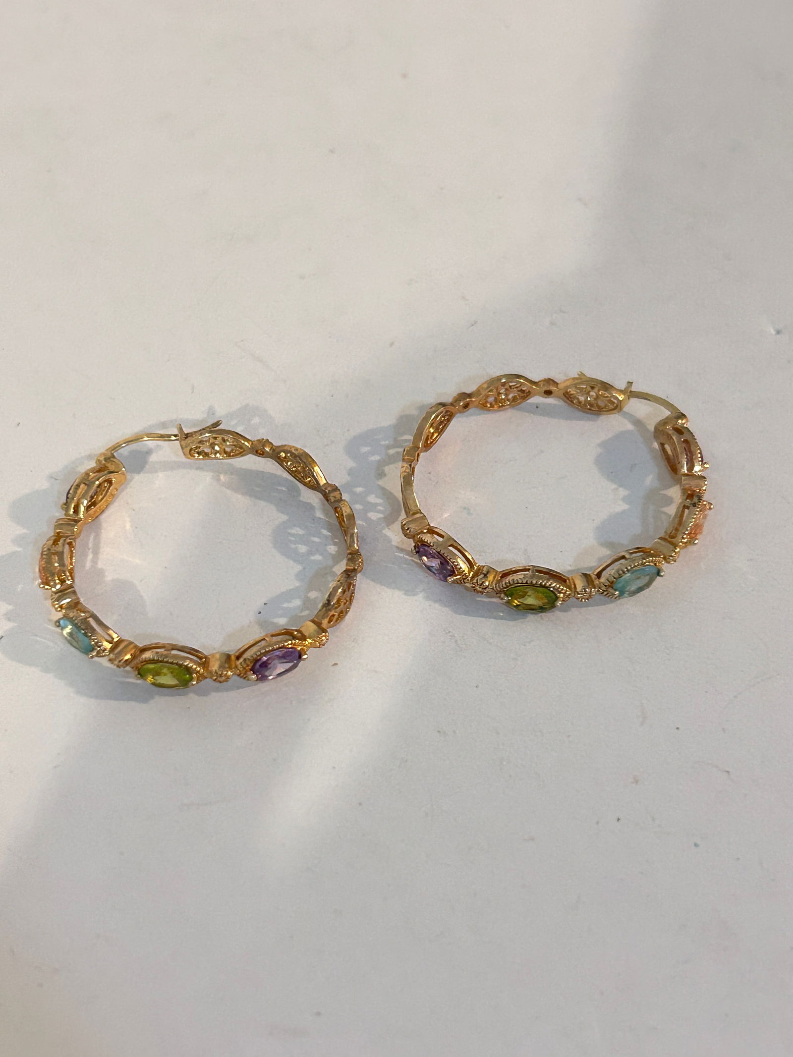 Vintage multi color hoop earrings PJM: Vintage multi color hoop earrings PJM Please view all photos as they are part of the description and condition of this Item, Feel free to contact me with questions or picture requests! Used Item AS IS