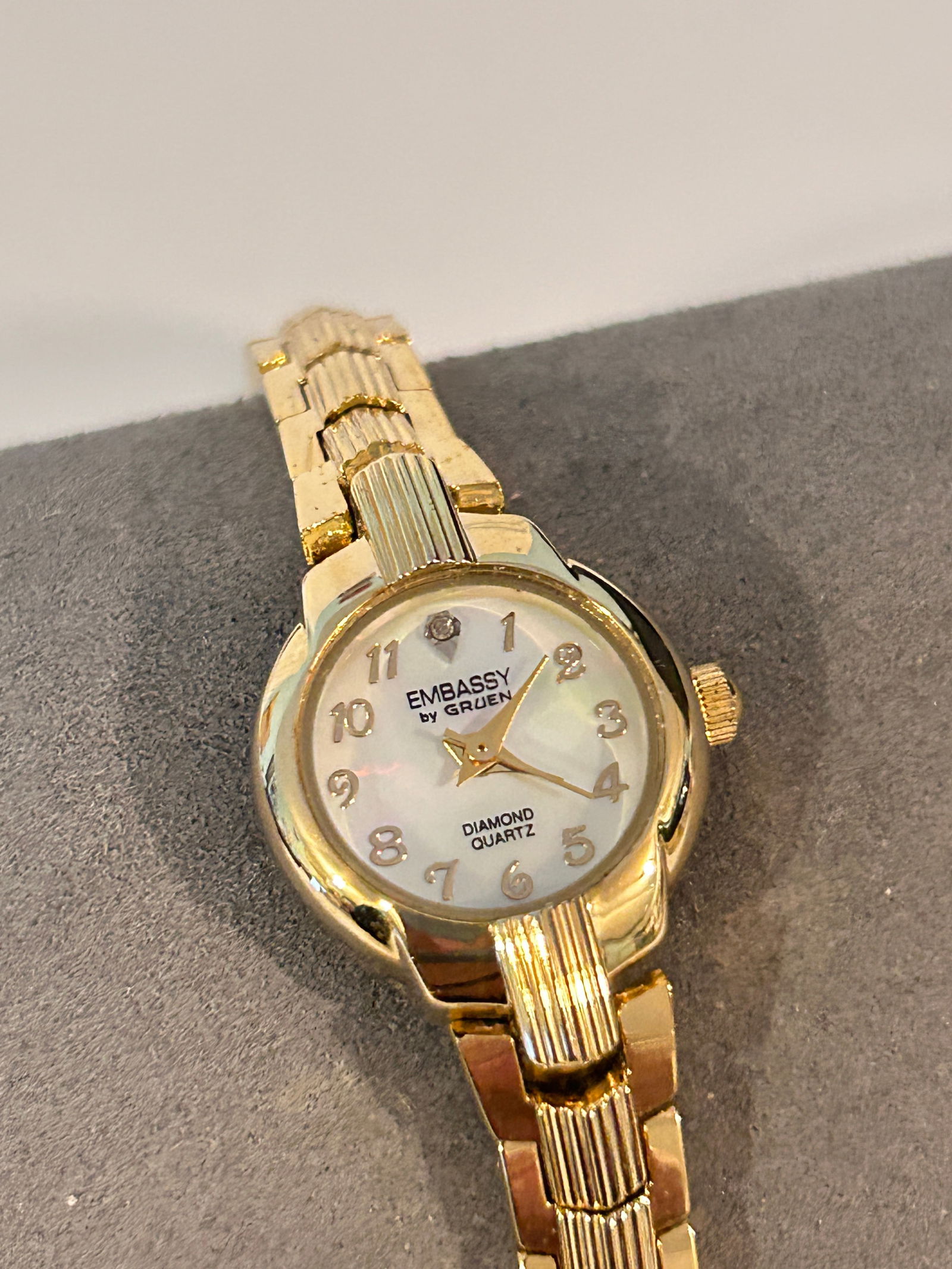 gold-tone Embassy by Gruen women's Diamond Quartz watch with a mother-of-pearl dial working: gold-tone Embassy by Gruen women's Diamond Quartz watch with a mother-of-pearl dial working Please view all photos as they are part of the description and condition of this Item, Feel free to contact