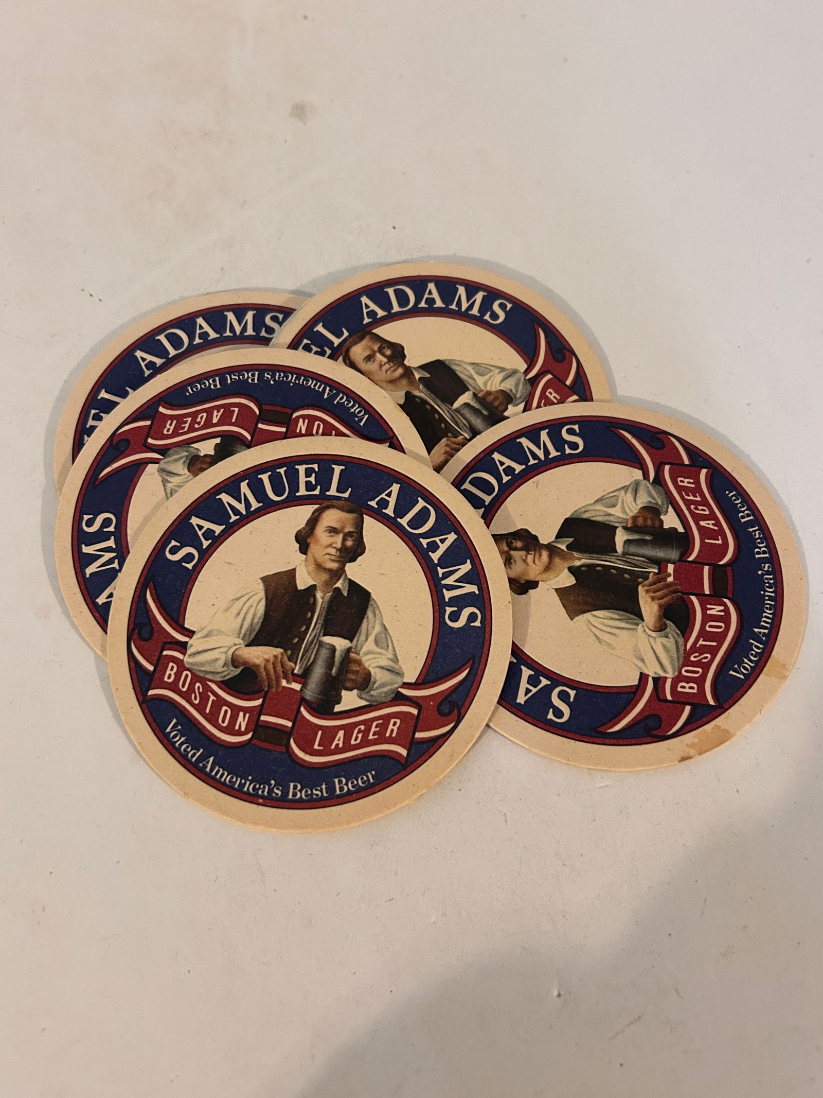 5 Vintage Samuel Adams Beer Coasters: 5 Vintage Samuel Adams Beer Coasters Please view all photos as they are part of the description and condition of this Item, Feel free to contact me with questions or picture requests! Used Item AS IS