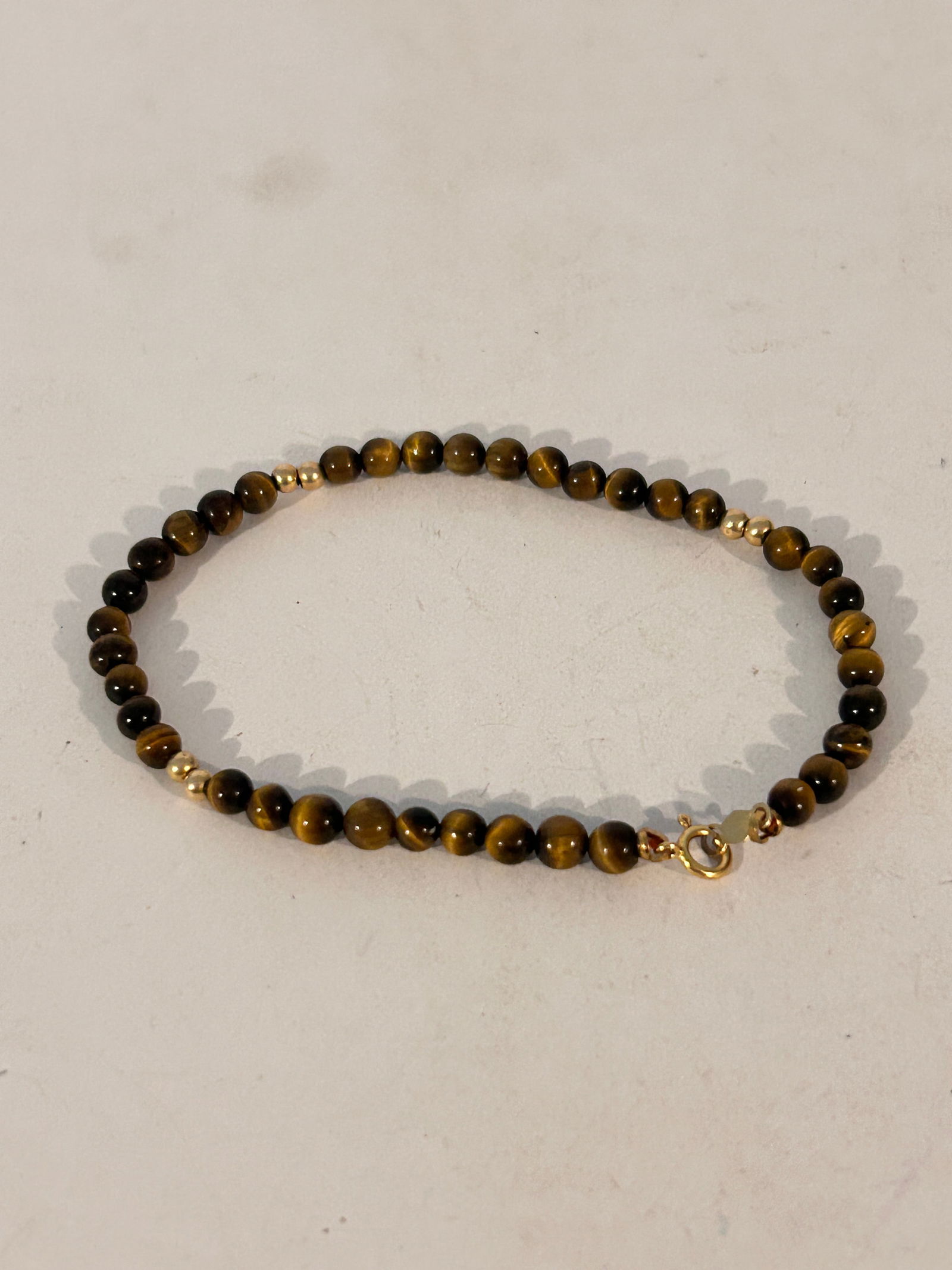 Vintage 14K Gold Tigers Eye bead Bracelet sz 7": Vintage 14K Gold Tigers Eye bead Bracelet sz 7" Please view all photos as they are part of the description and condition of this Item, Feel free to contact me with questions or picture requests! Used