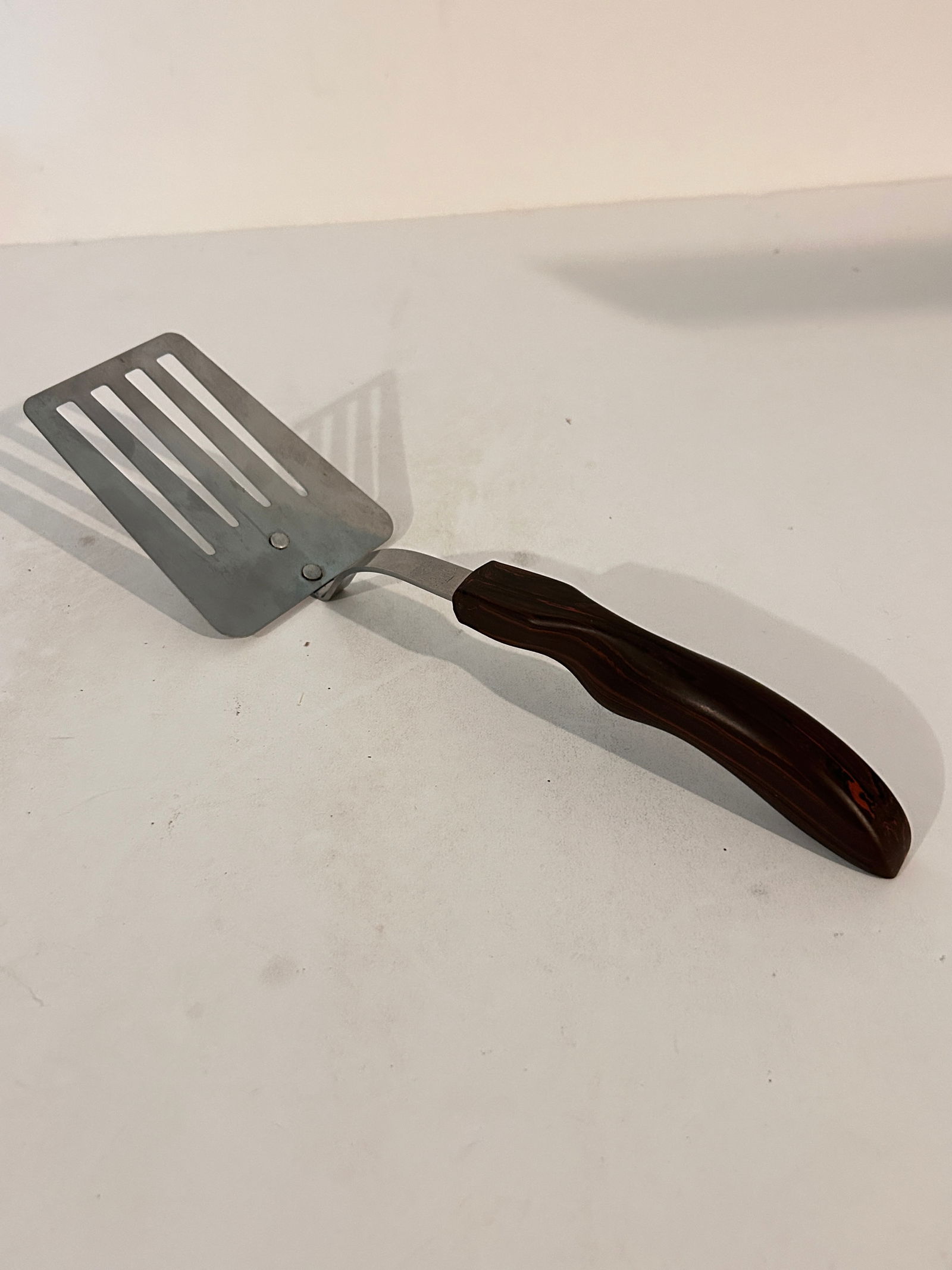 Cutco Model 16 Slotted Turner with a classic dark brown handle (1 of 7)