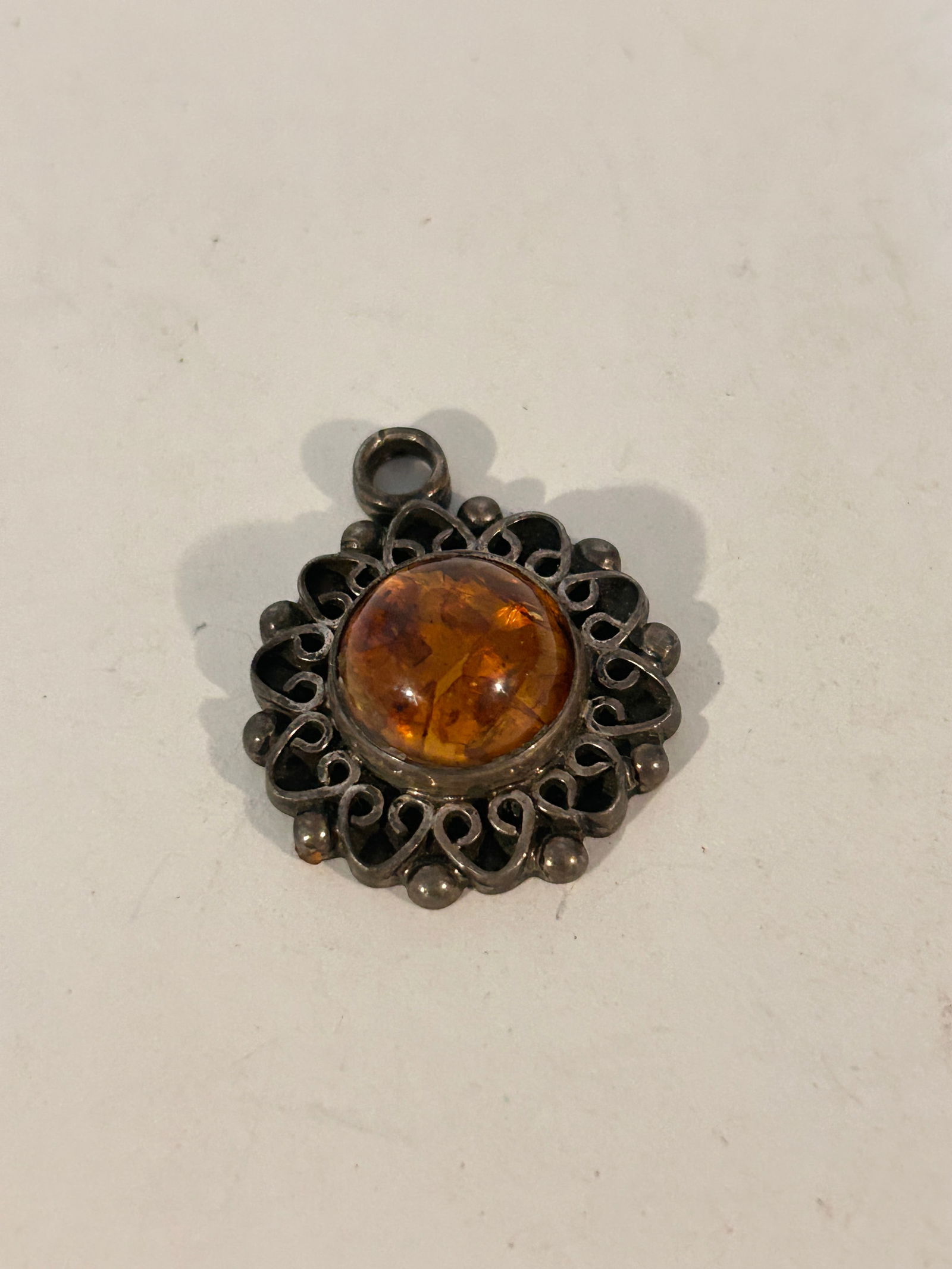 Sterling Silver Baltic Amber Sun filigree Pendant 16 Grams: Sterling Silver Baltic Amber Sun filigree Pendant 16 Grams Please view all photos as they are part of the description and condition of this Item, Feel free to contact me with questions or picture requ