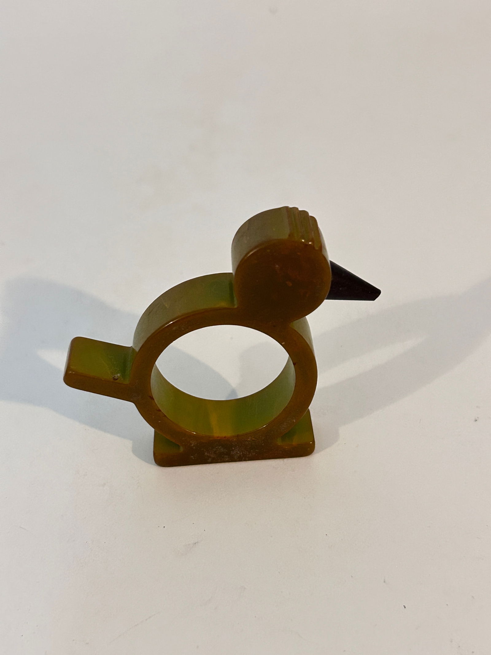 Vintage Antique Butterscotch Bakelite Bird Napkin Ring Holder: Vintage Antique Butterscotch Bakelite Bird Napkin Ring Holder Please view all photos as they are part of the description and condition of this Item, Feel free to contact me with questions or picture r