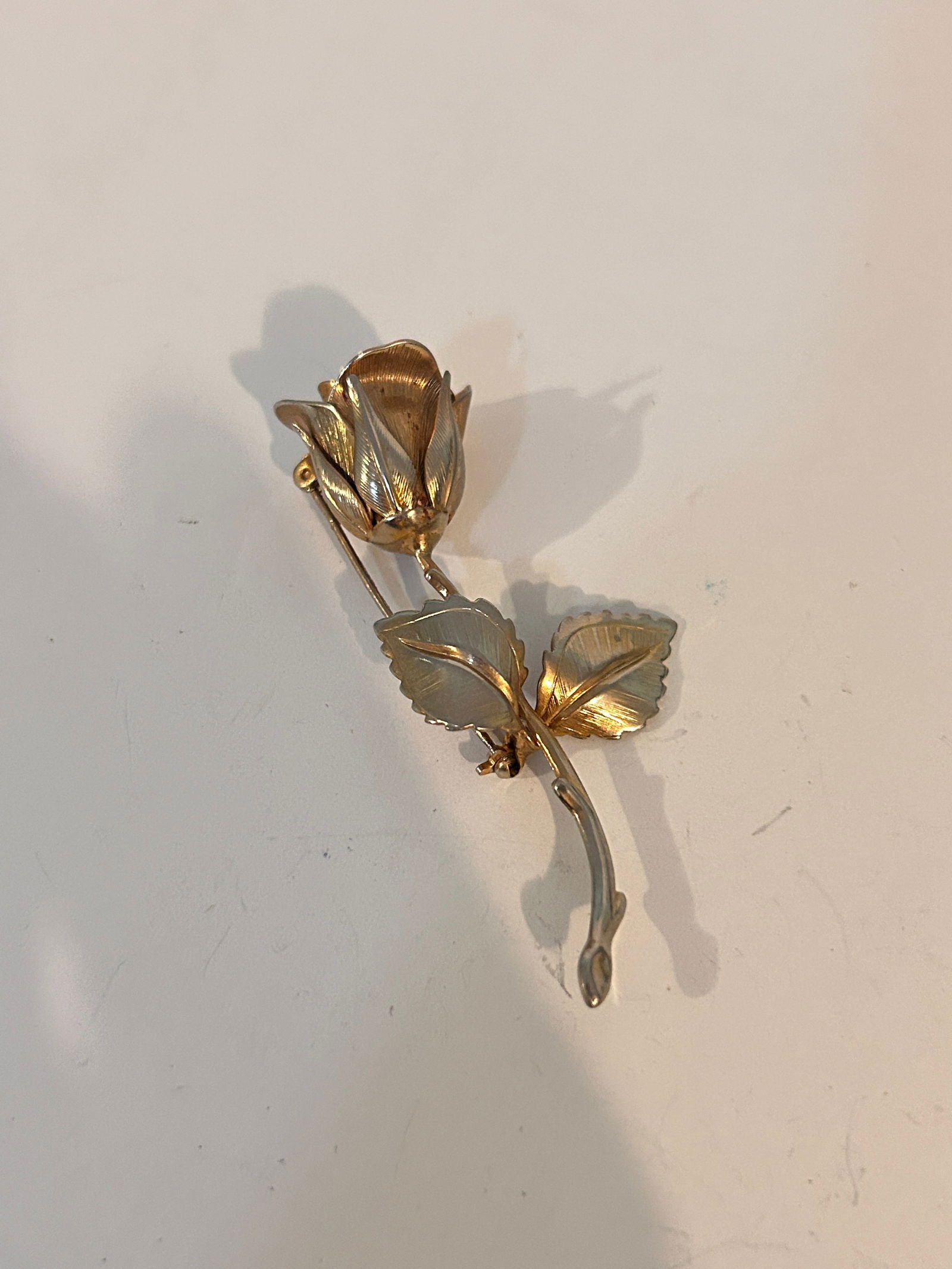 Vintage Giovanni Stem Rose Brooch/pin-brushed gold-tone: Vintage Giovanni Stem Rose Brooch/pin-brushed gold-tone Please view all photos as they are part of the description and condition of this Item, Feel free to contact me with questions or picture request