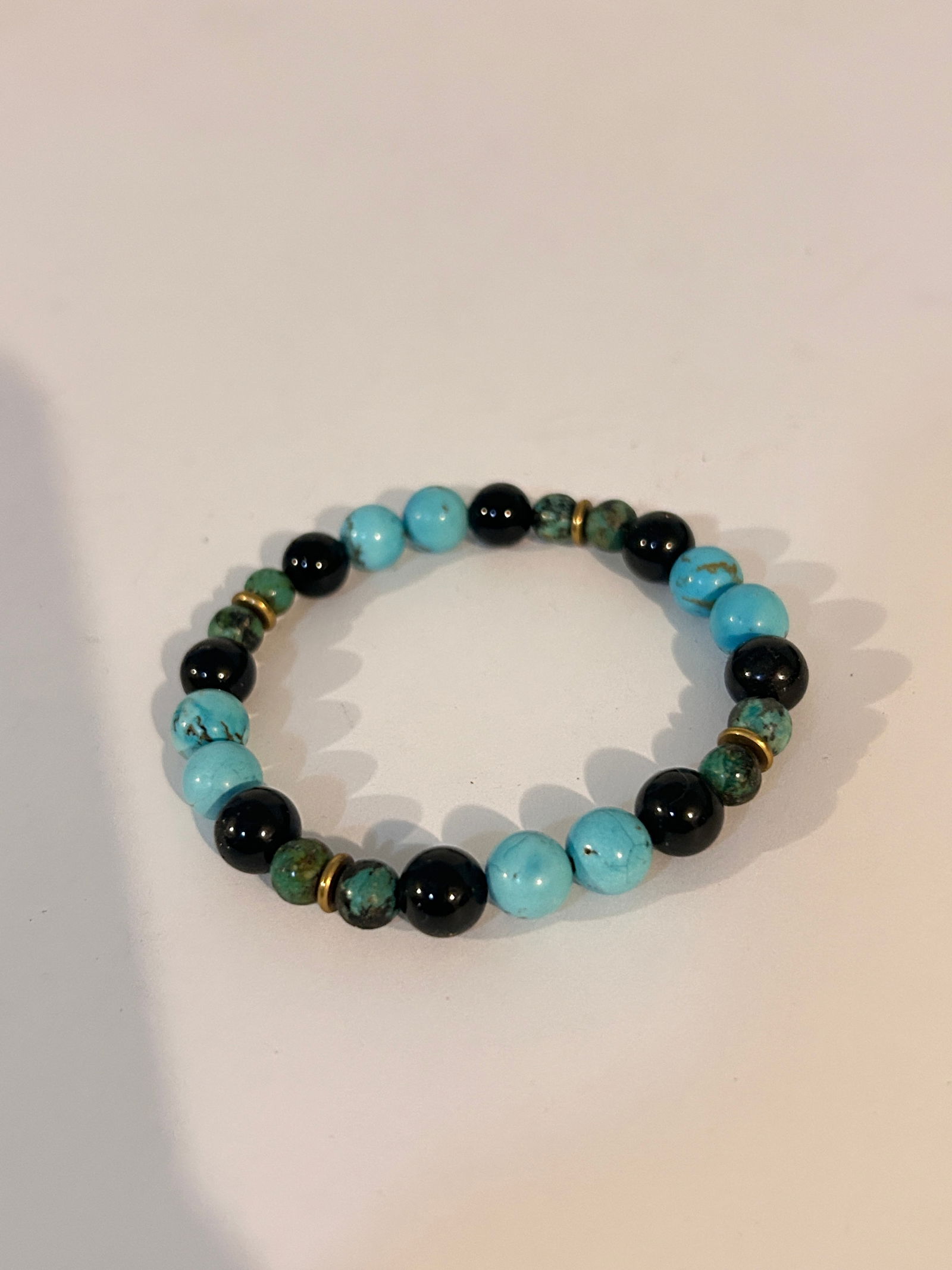 Vintage blue bead stretch Turquoise Bracelet: Vintage blue bead stretch Turquoise Bracelet Please view all photos as they are part of the description and condition of this Item, Feel free to contact me with questions or picture requests! Used Ite