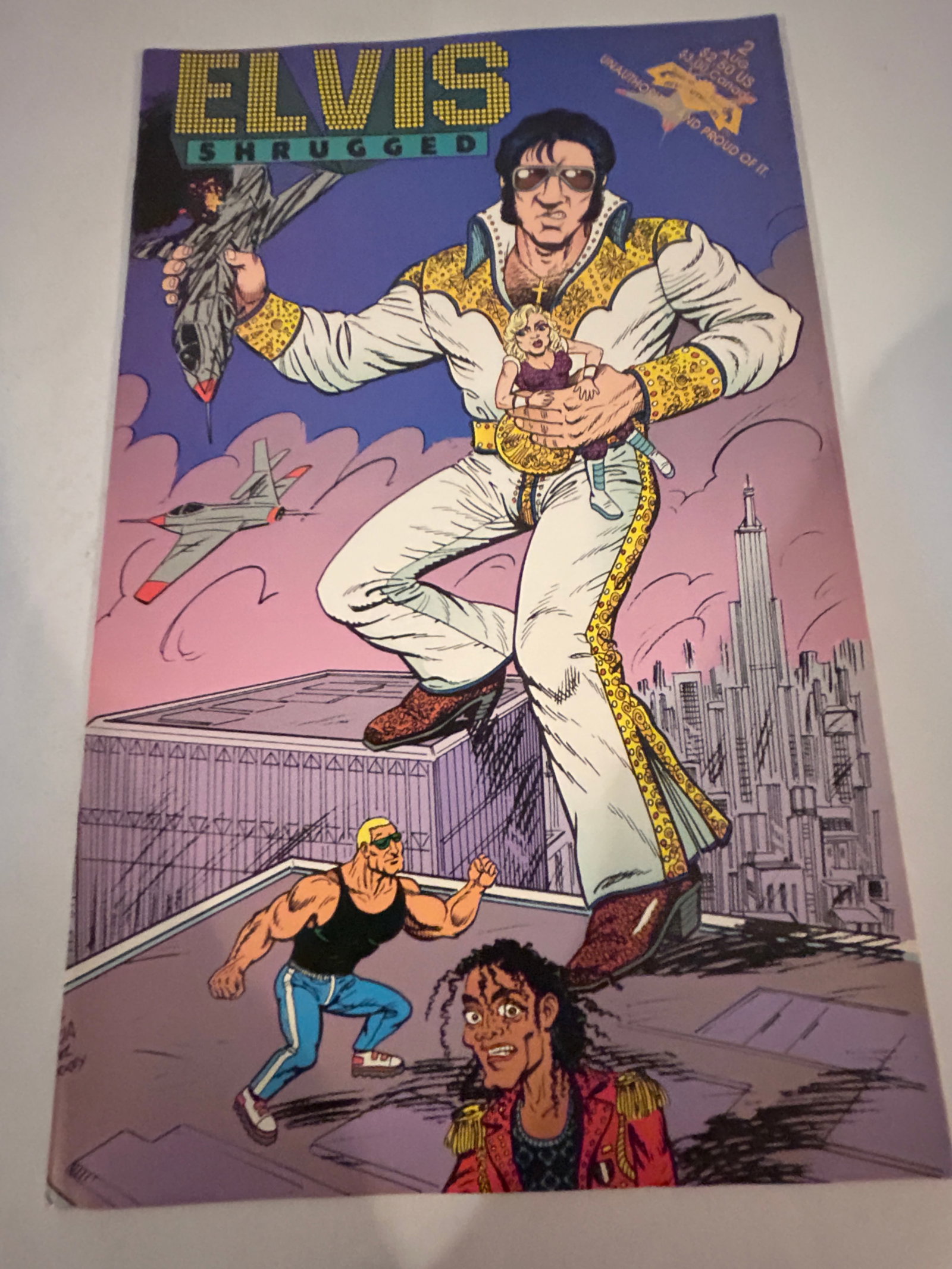 Vintage Comic Book Elvis Shrugged # 2: Vintage Comic Book Elvis Shrugged # 2 Please view all photos as they are part of the description and condition of this Item, Feel free to contact me with questions or picture requests! Used Item AS IS