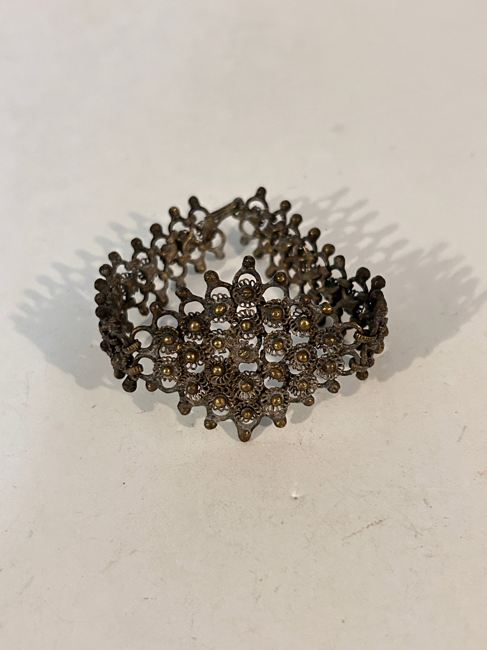 Vintage Old 1920s filigree brass ornate Bracelet 8": Vintage Old 1920s filigree brass ornate Bracelet 8" Please view all photos as they are part of the description and condition of this Item, Feel free to contact me with questions or picture requests! U