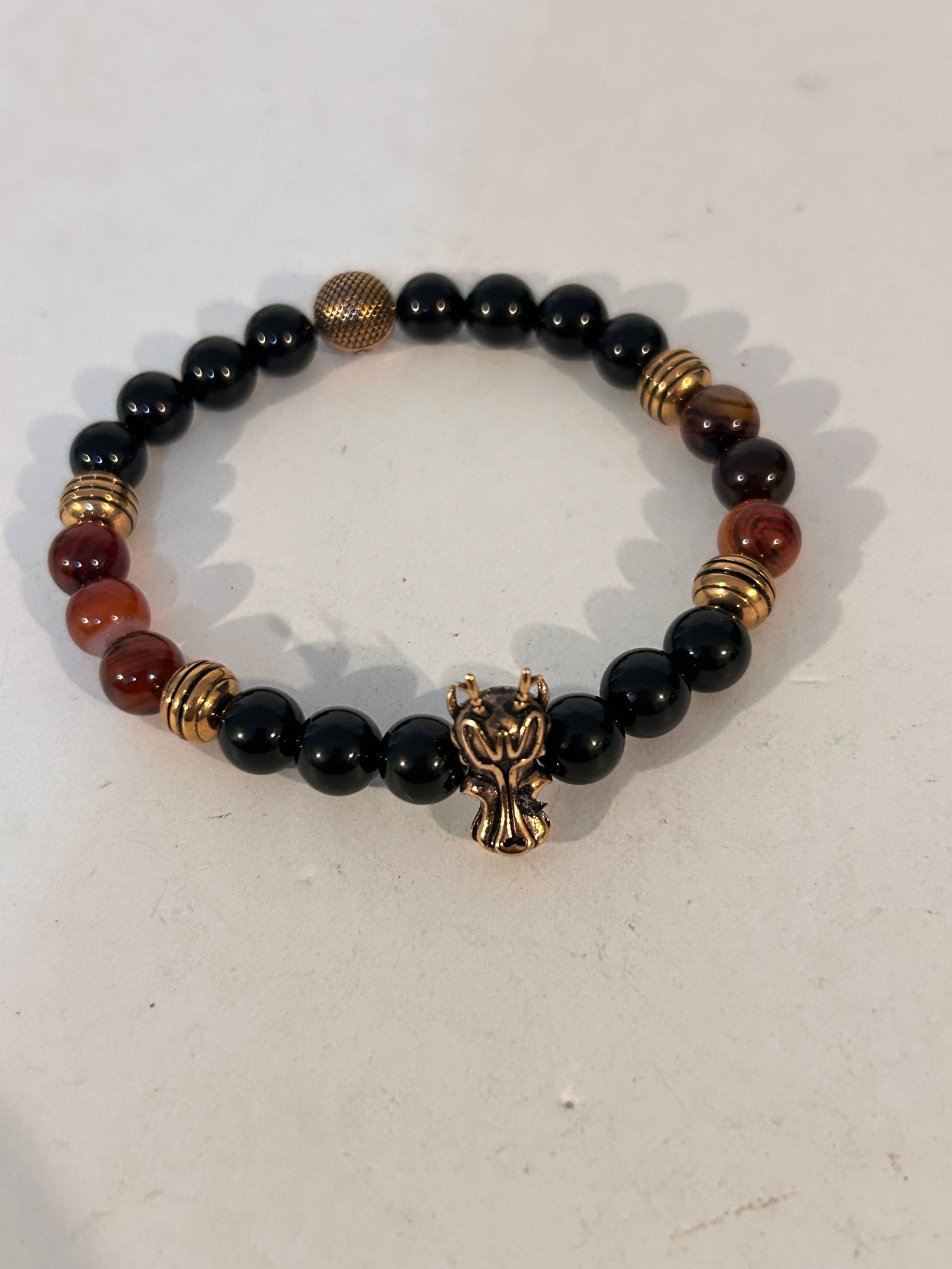 Invicta Men's Onyx multi gem Beaded Bracelet stretch: Invicta Men's Onyx multi gem Beaded Bracelet stretch Please view all photos as they are part of the description and condition of this Item, Feel free to contact me with questions or picture requests!