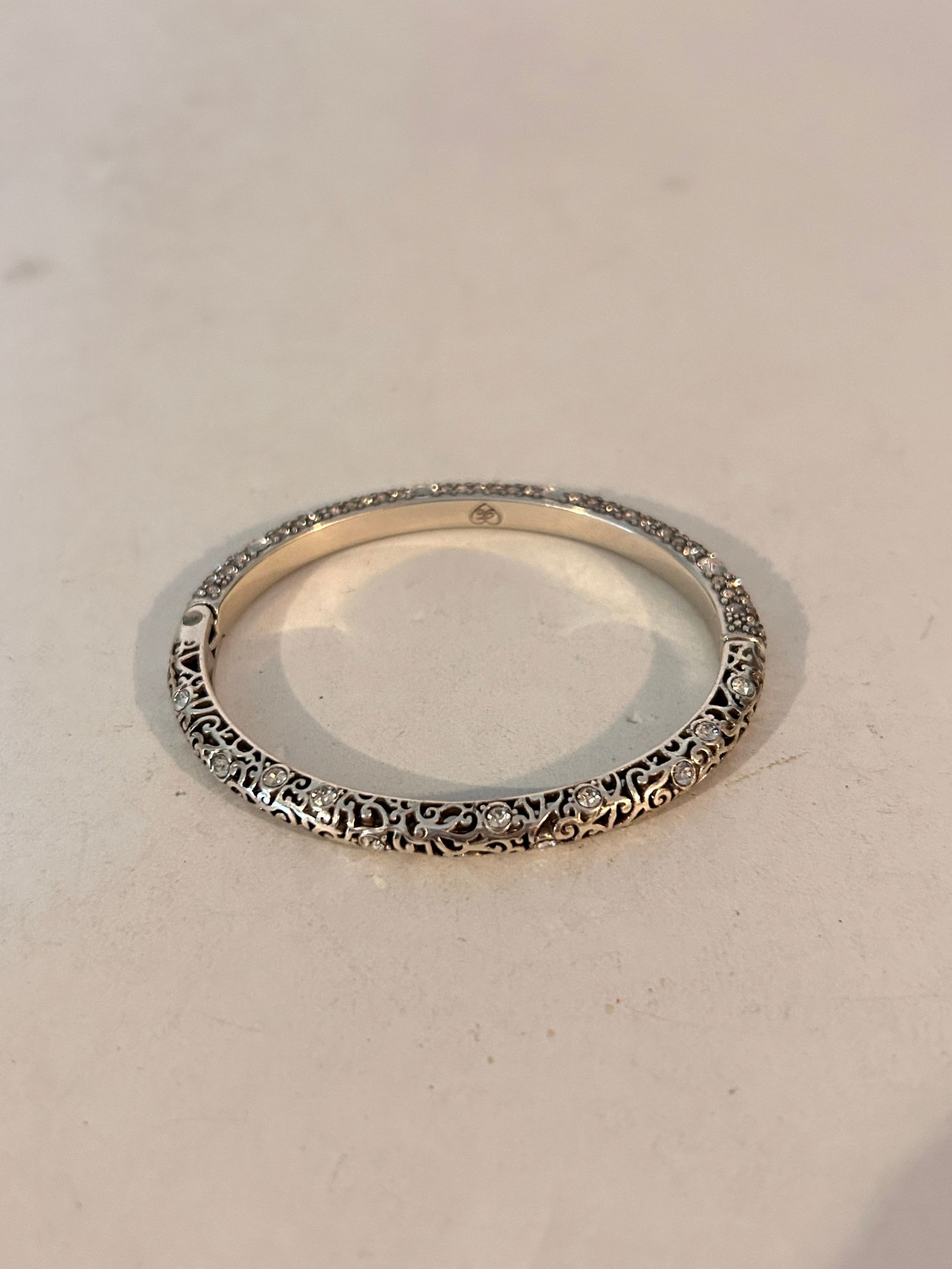 Retired Brighton Silver Crystal Filigree Round Hinge Bangle Bracelet 7": Retired Brighton Silver Crystal Filigree Round Hinge Bangle Bracelet 7" Please view all photos as they are part of the description and condition of this Item, Feel free to contact me with questions or