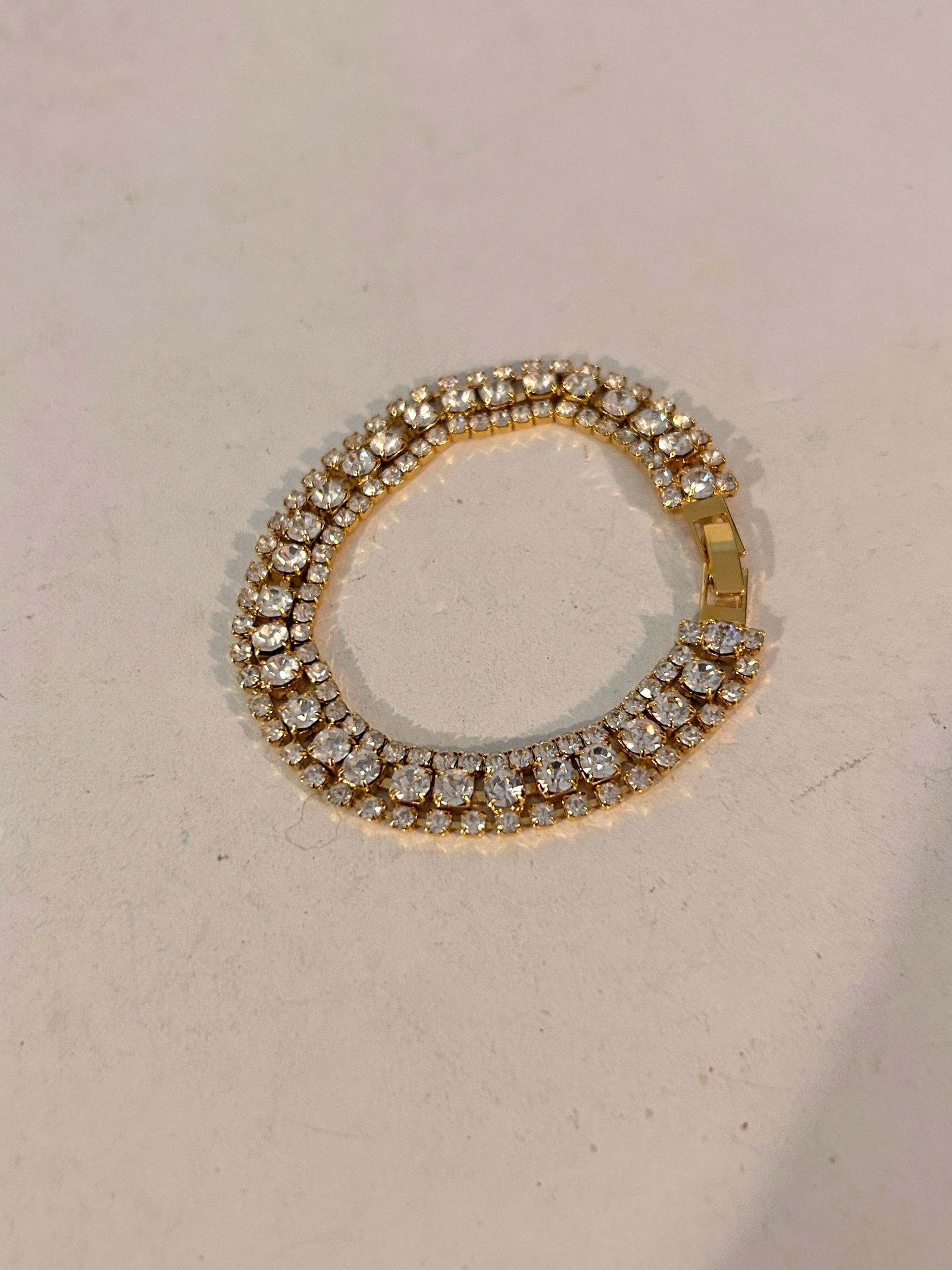 Vintage Rhinestone Bauer gold tone Bracelet 7": Vintage Rhinestone Bauer gold tone Bracelet 7" Please view all photos as they are part of the description and condition of this Item, Feel free to contact me with questions or picture requests! Used I