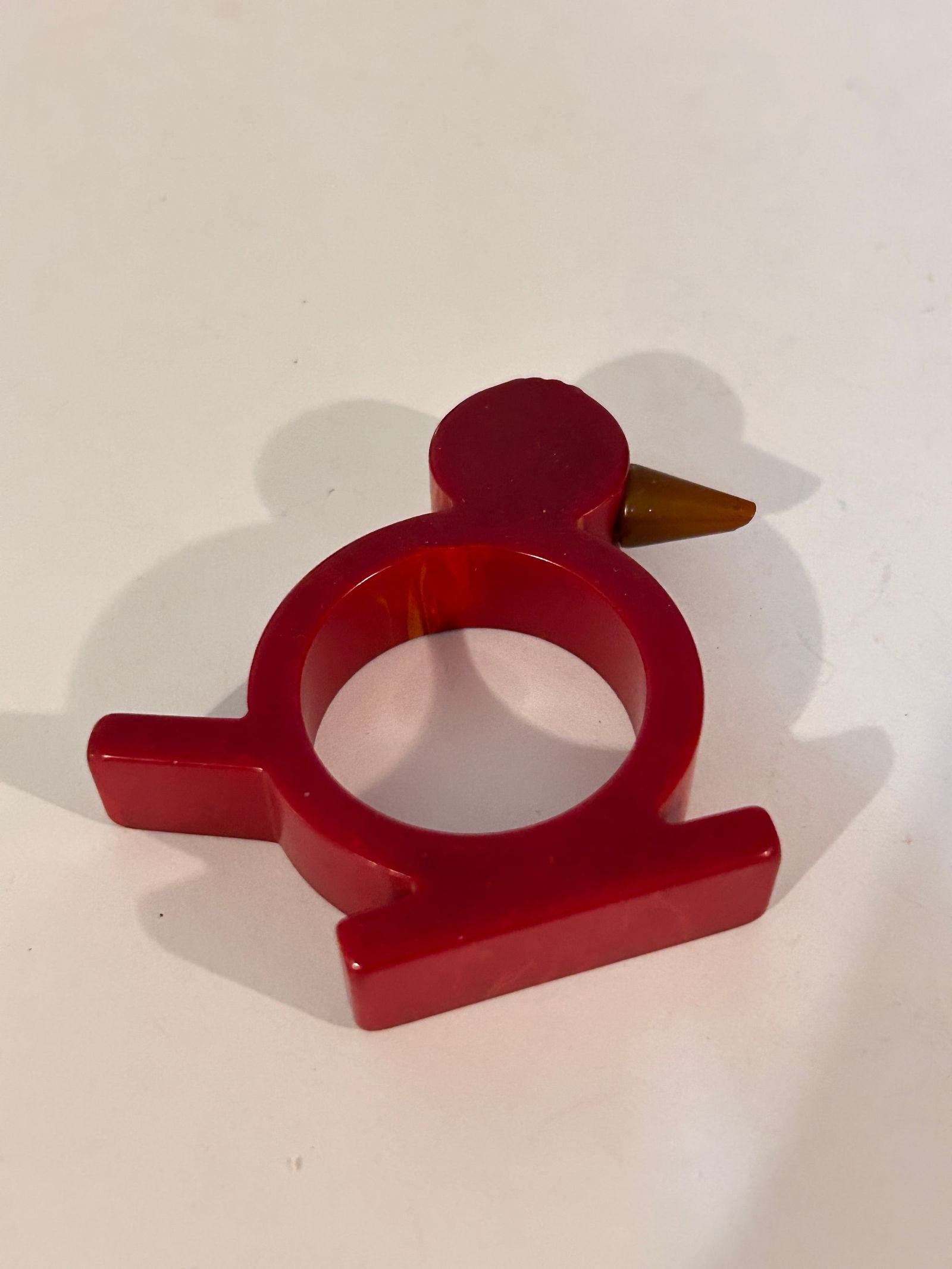 Bakelite Bird Chick Napkin Ring Holder Red w/ Brown Beak Art Deco: Bakelite Bird Chick Napkin Ring Holder Red w/ Brown Beak Art Deco Please view all photos as they are part of the description and condition of this Item, Feel free to contact me with questions or pictu