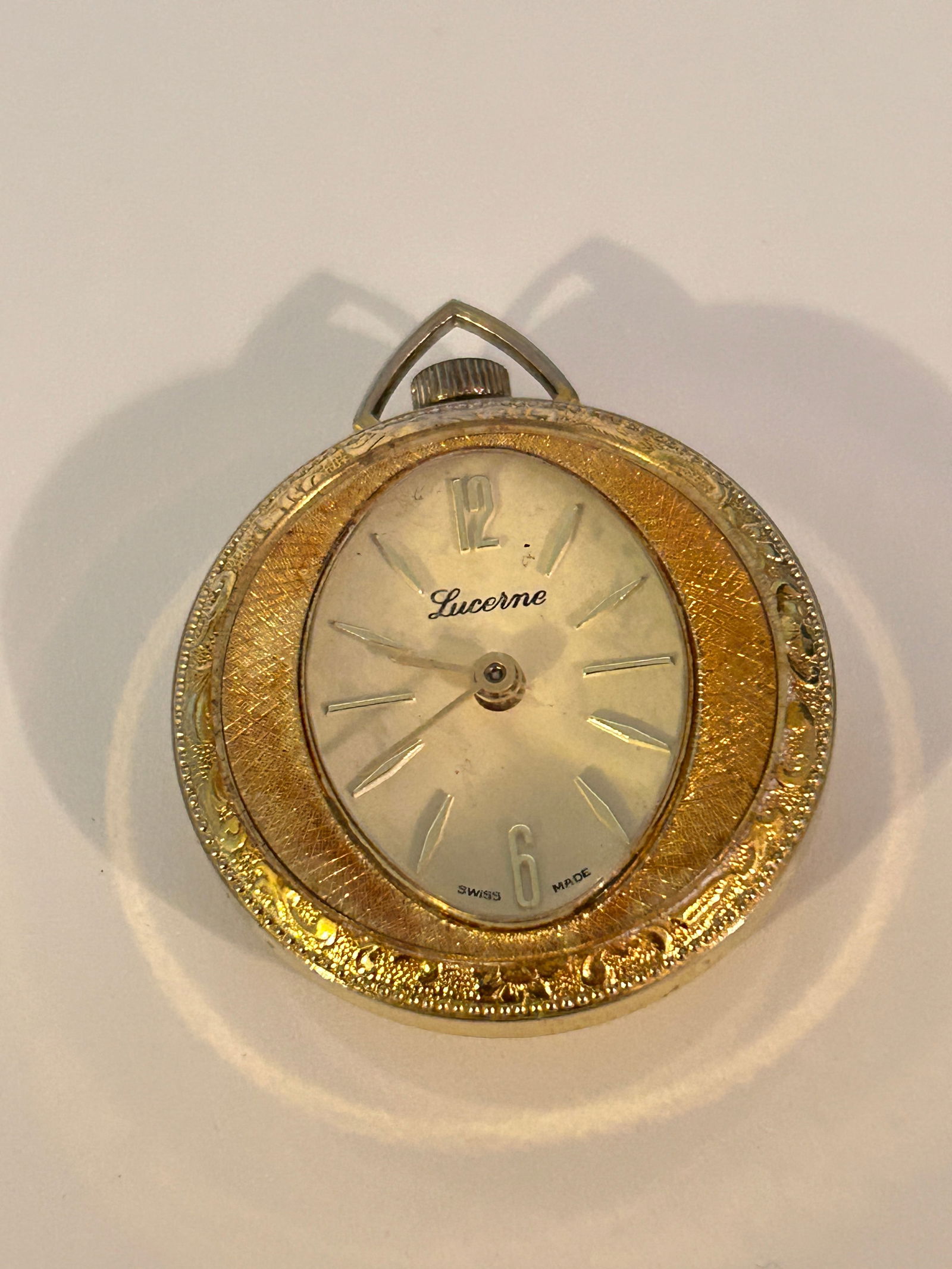 Vintage Lucerne Wind-up Analog Gold Tone Pocket Pendant Watch working: Vintage Lucerne Wind-up Analog Gold Tone Pocket Pendant Watch working Please view all photos as they are part of the description and condition of this Item, Feel free to contact me with questions or p