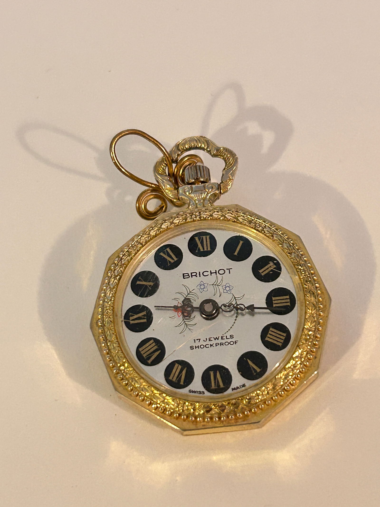 Vintage Brichot Wind-up Analog Gold Tone Pocket Pendant Watch working: Vintage Brichot Wind-up Analog Gold Tone Pocket Pendant Watch working Please view all photos as they are part of the description and condition of this Item, Feel free to contact me with questions or p