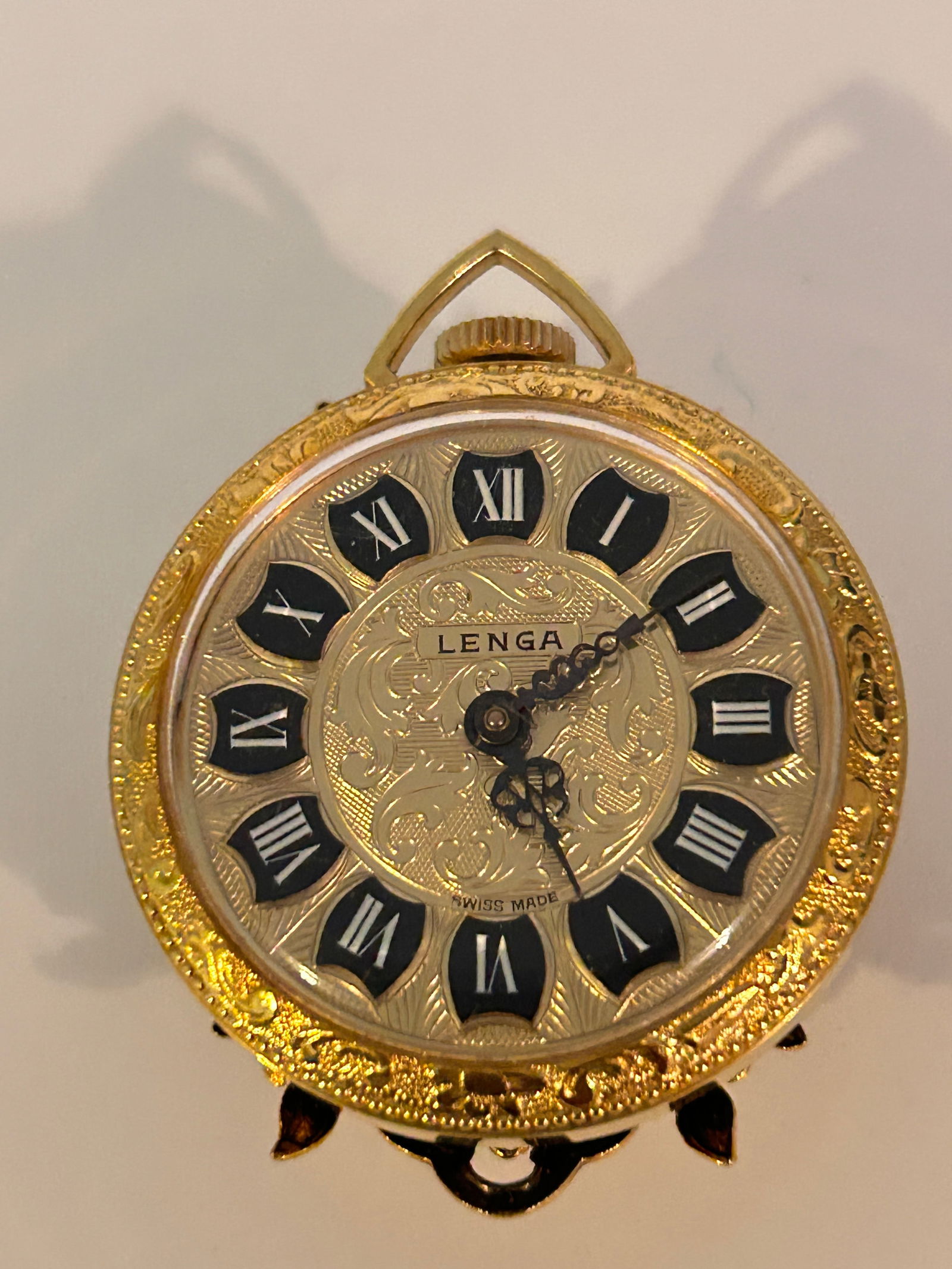 Vintage LENGA Wind-up Gold Tone Pocket Pendant Watch working: Vintage LENGA Wind-up Gold Tone Pocket Pendant Watch working Please view all photos as they are part of the description and condition of this Item, Feel free to contact me with questions or picture re