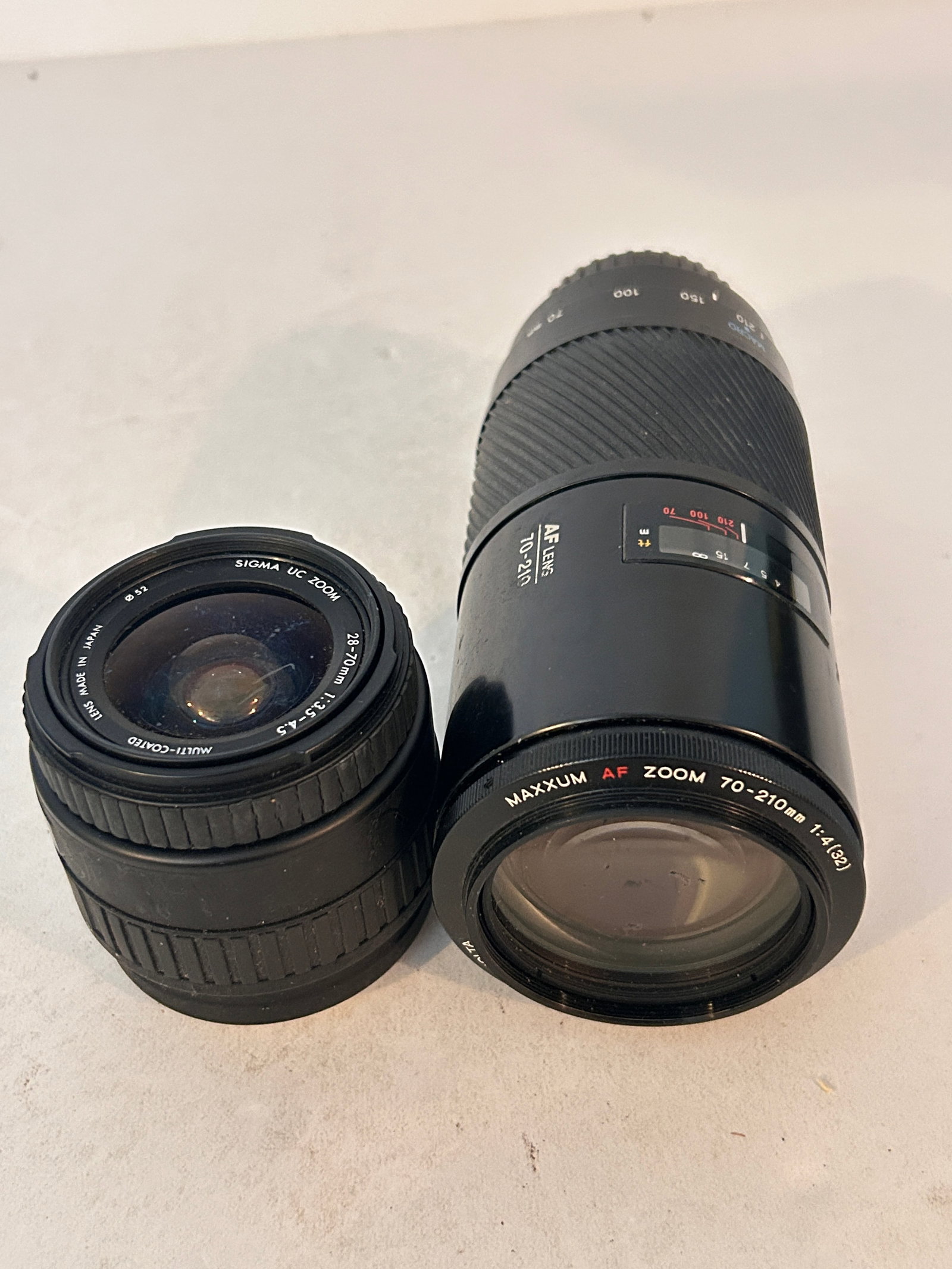 Pair Of Vintage Lenses Minolta Maxxam AF Zoom 70-210mm 1:4 & Sigma UC Zoom 28-70mm 1:3.5-4.5: Pair Of Vintage Lenses Minolta Maxxam AF Zoom 70-210mm 1:4 & Sigma UC Zoom 28-70mm 1:3.5-4.5 Please view all photos as they are part of the description and condition of this Item, Feel free to contact