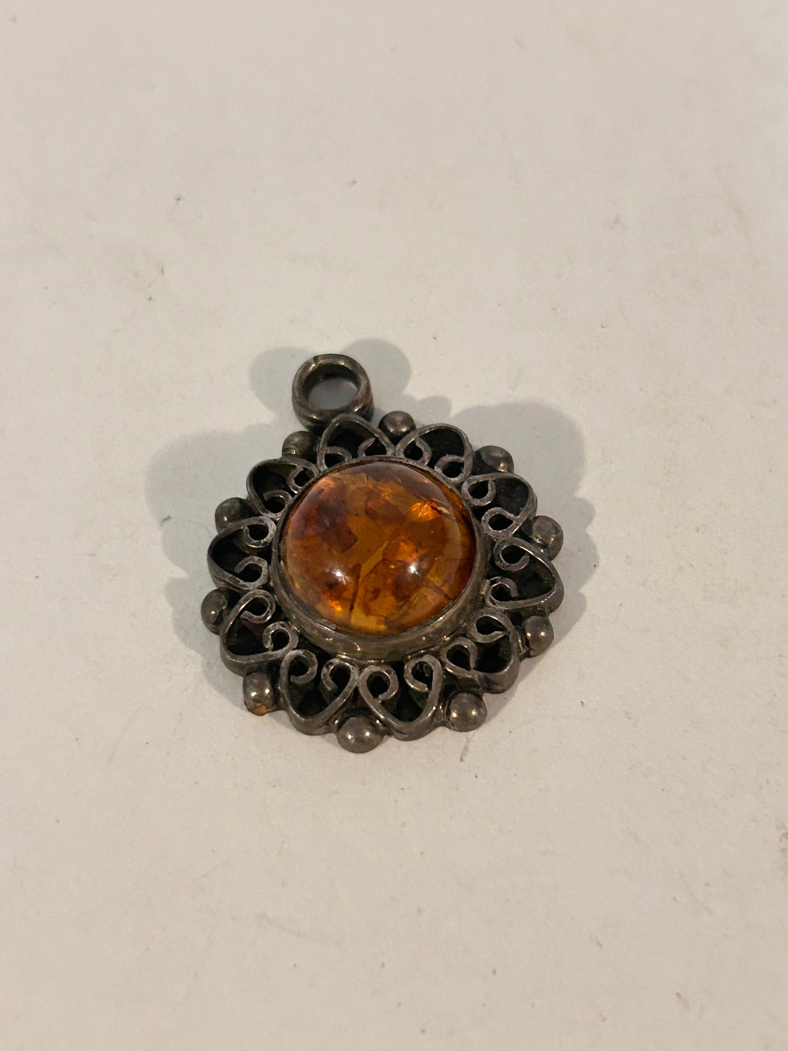 Sterling Silver Baltic Amber Sun filigree Pendant 16 Grams: Sterling Silver Baltic Amber Sun filigree Pendant 16 Grams Please view all photos as they are part of the description and condition of this Item, Feel free to contact me with questions or picture requ