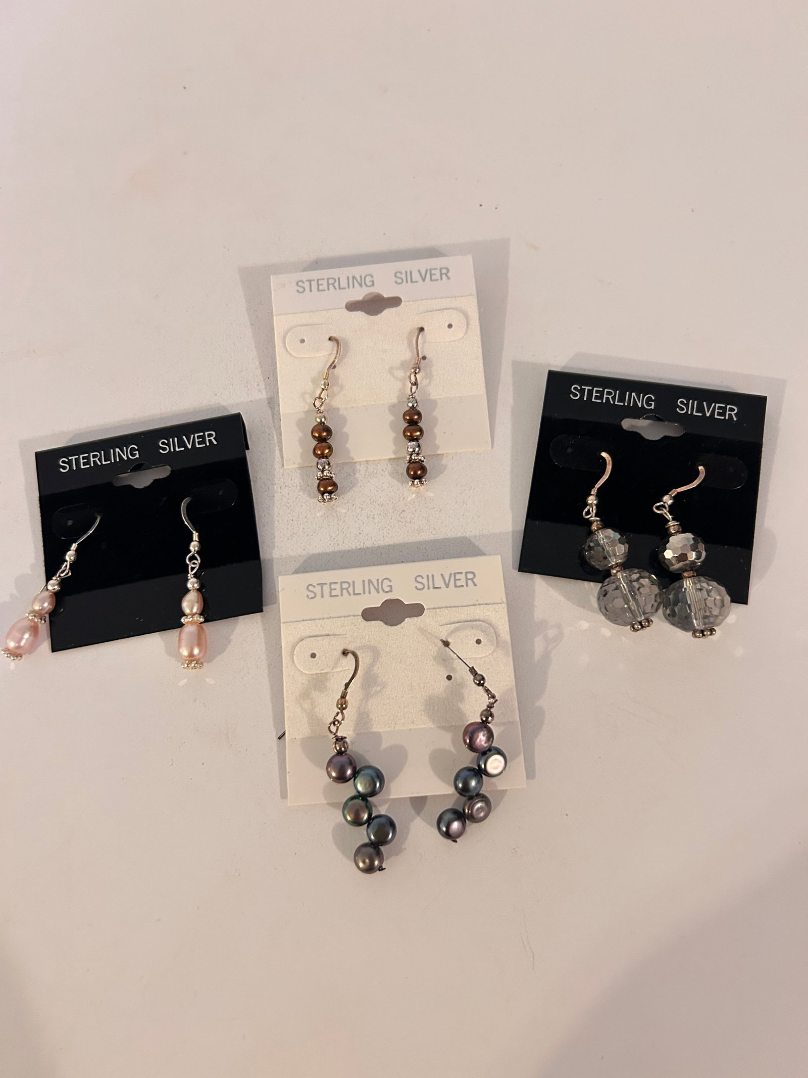 Vintage Lot of 4 Sterling Silver Earrings: Vintage Lot of 4 Sterling Silver Earrings Please view all photos as they are part of the description and condition of this Item, Feel free to contact me with questions or picture requests! Used Item A