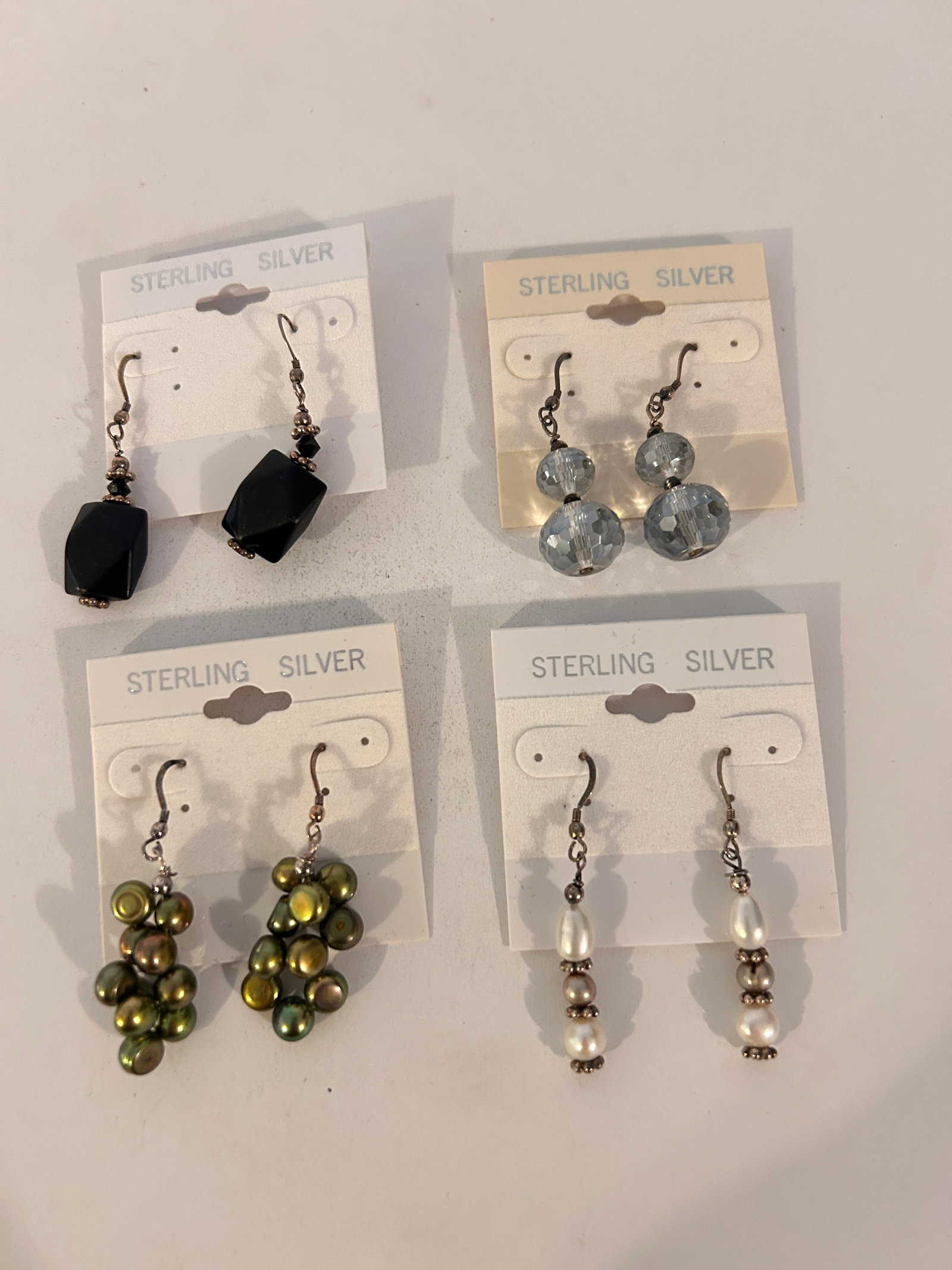 Vintage Lot of 4 Sterling Silver Earrings: Vintage Lot of 4 Sterling Silver Earrings Please view all photos as they are part of the description and condition of this Item, Feel free to contact me with questions or picture requests! Used Item A