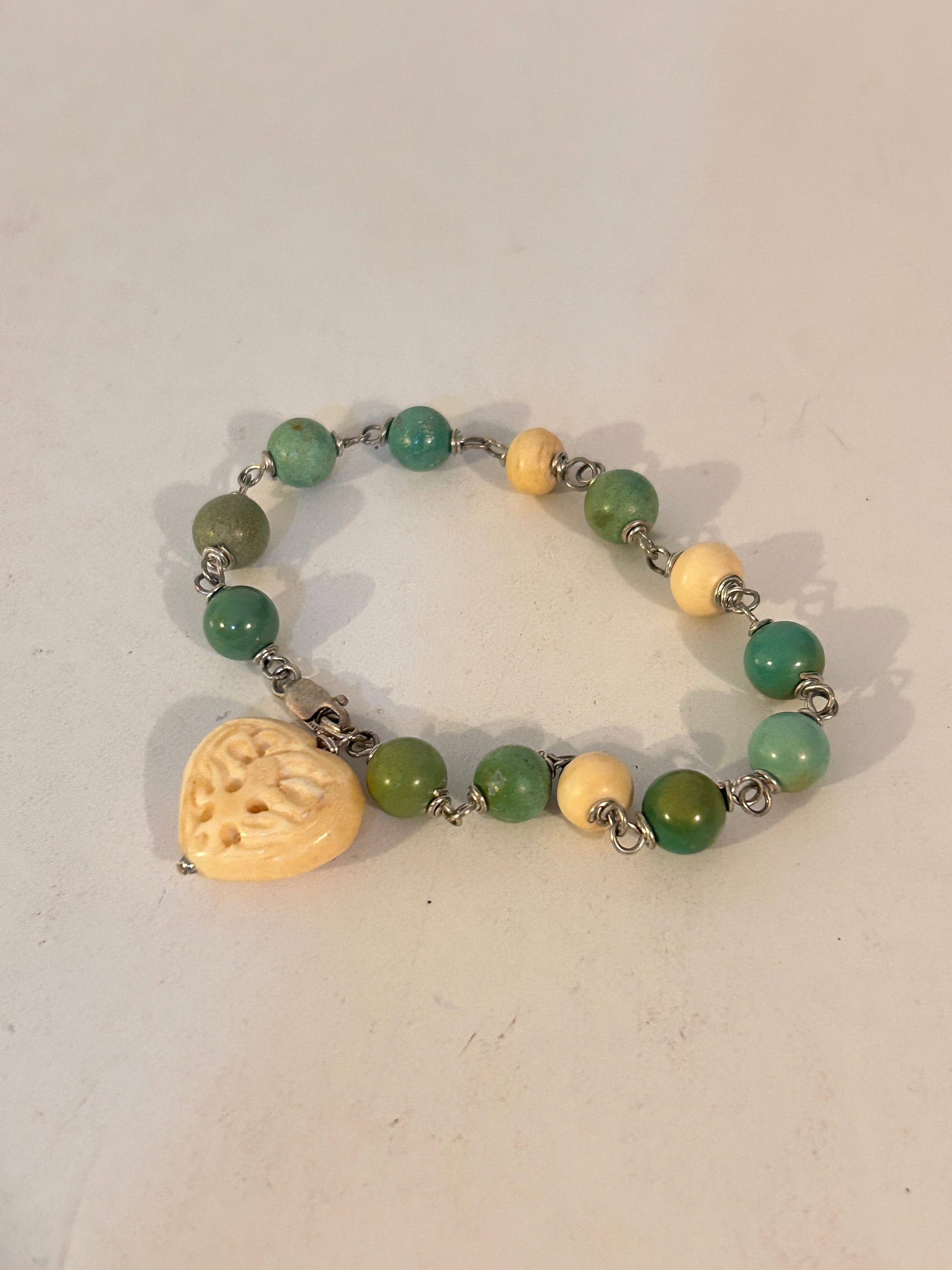 Vintage Sterling Silver Bone heart Bracelet 7": Vintage Sterling Silver Bone heart Bracelet 7" Please view all photos as they are part of the description and condition of this Item, Feel free to contact me with questions or picture requests! Used I