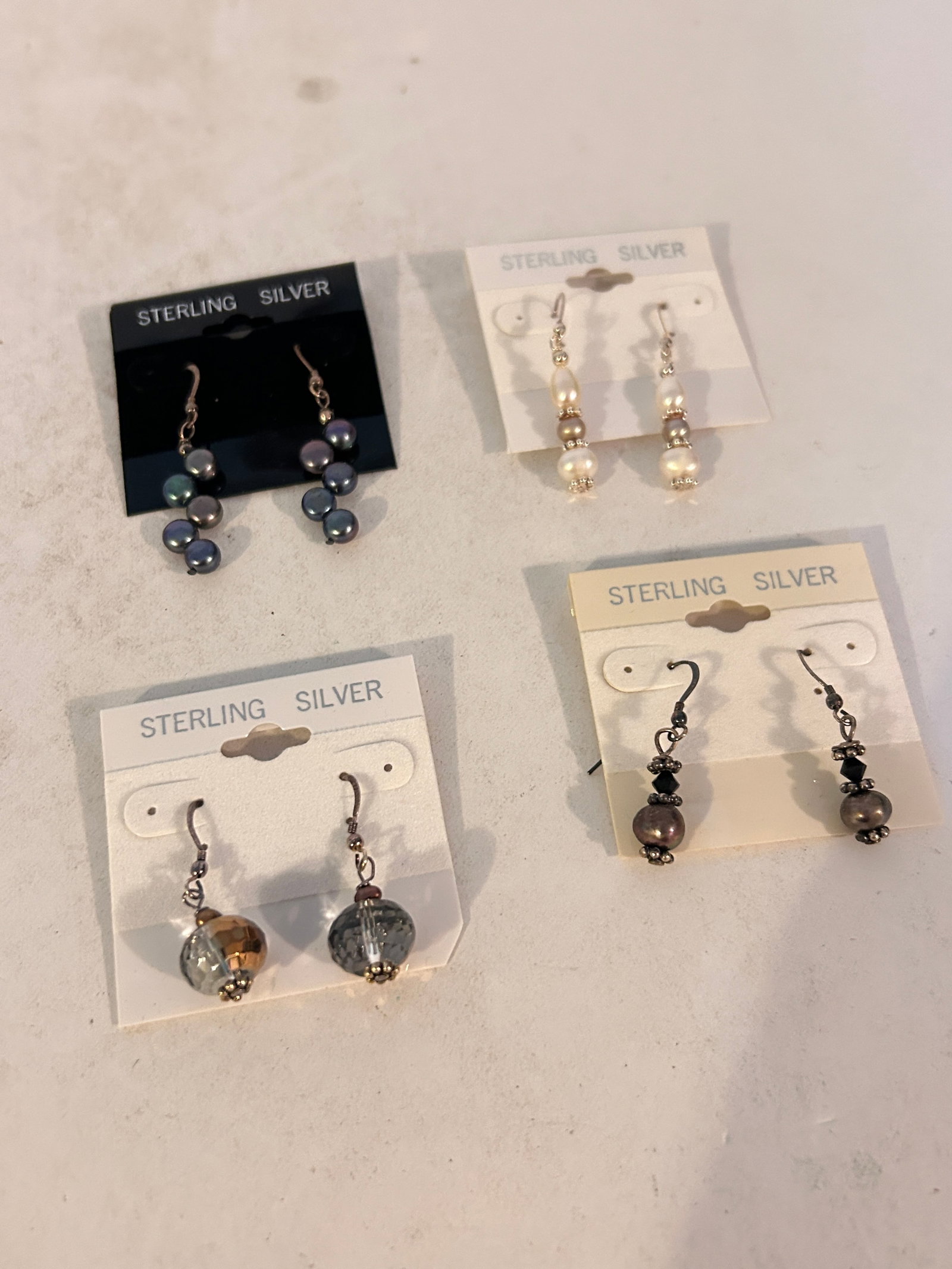 Lot of 4 Sterling Silver Earrings: Lot of 4 Sterling Silver Earrings Please view all photos as they are part of the description and condition of this Item, Feel free to contact me with questions or picture requests! Used Item AS IS