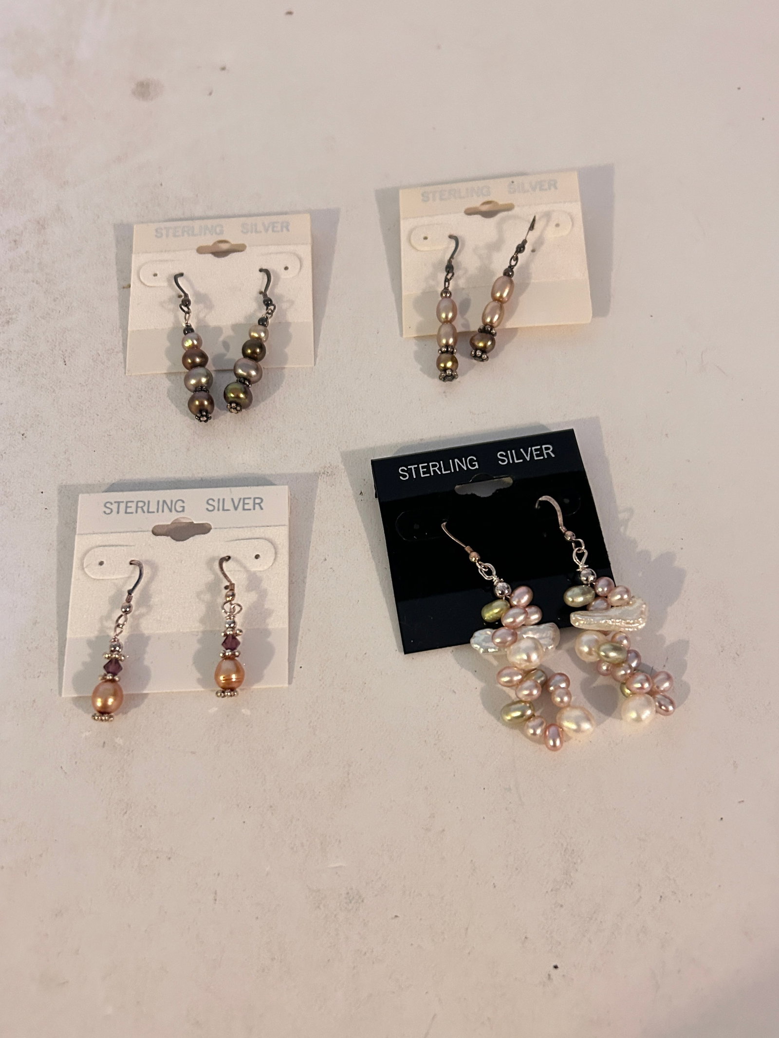 Lot of 4 Sterling Silver Earrings: Lot of 4 Sterling Silver Earrings Please view all photos as they are part of the description and condition of this Item, Feel free to contact me with questions or picture requests! Used Item AS IS