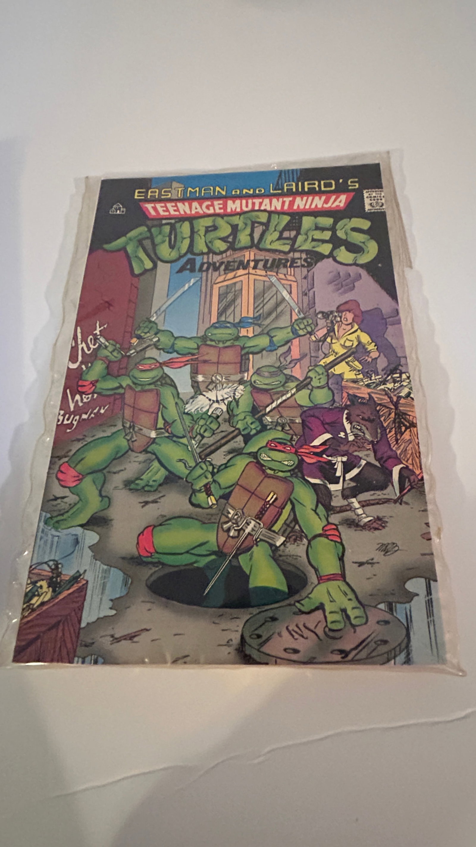 Vintage Comic Book Eastman & Laird"s Teenage Mutant Ninja Turtles Adventures with Tape: Vintage Comic Book Eastman & Laird"s Teenage Mutant Ninja Turtles Adventures with Tape Please view all photos as they are part of the description and condition of this Item, Feel free to contact me wi