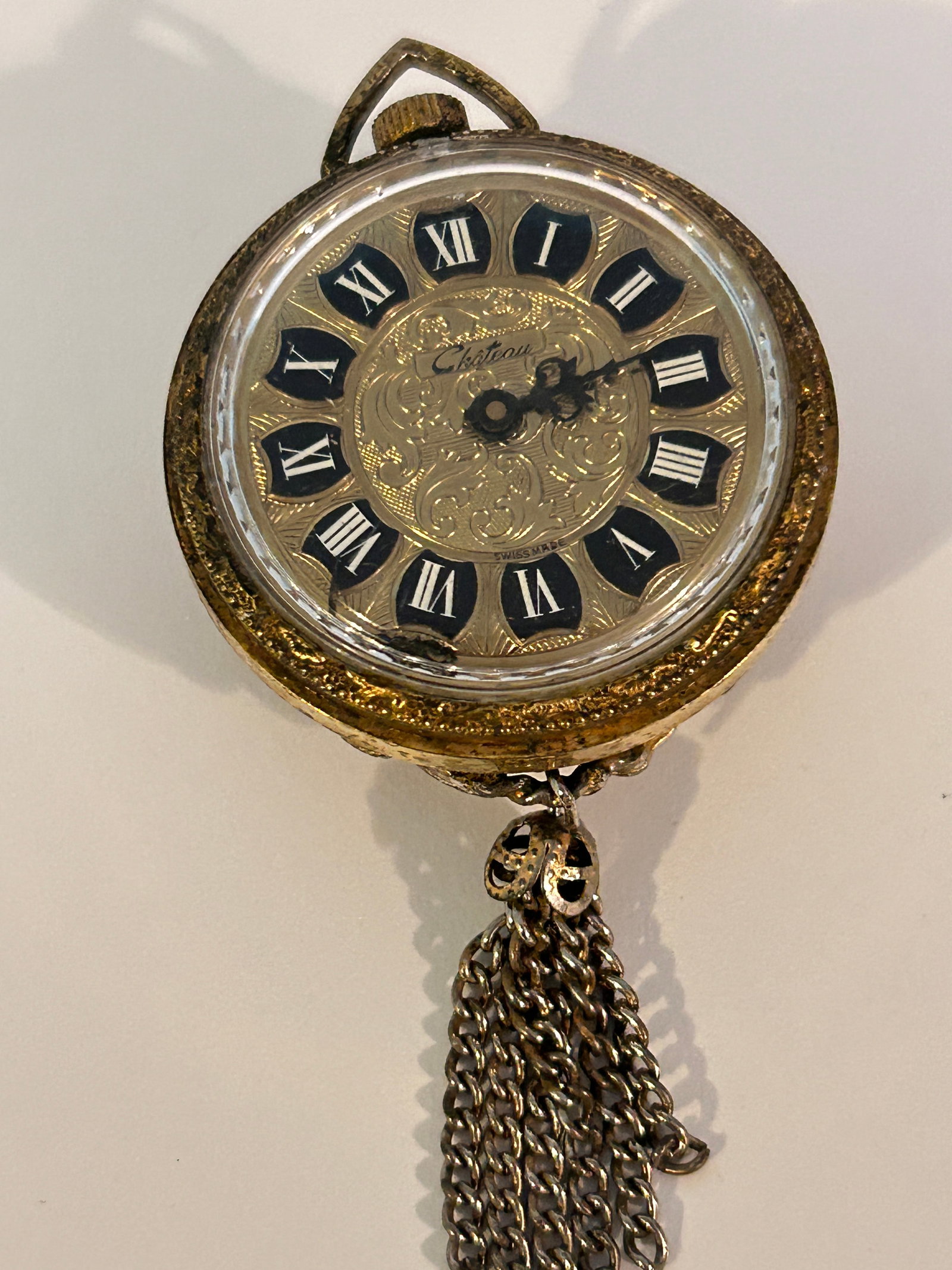 Vintage Chateau Gold Tone Cameo working Tassle Pendant Watch: Vintage Chateau Gold Tone Cameo working Tassle Pendant Watch Please view all photos as they are part of the description and condition of this Item, Feel free to contact me with questions or picture re