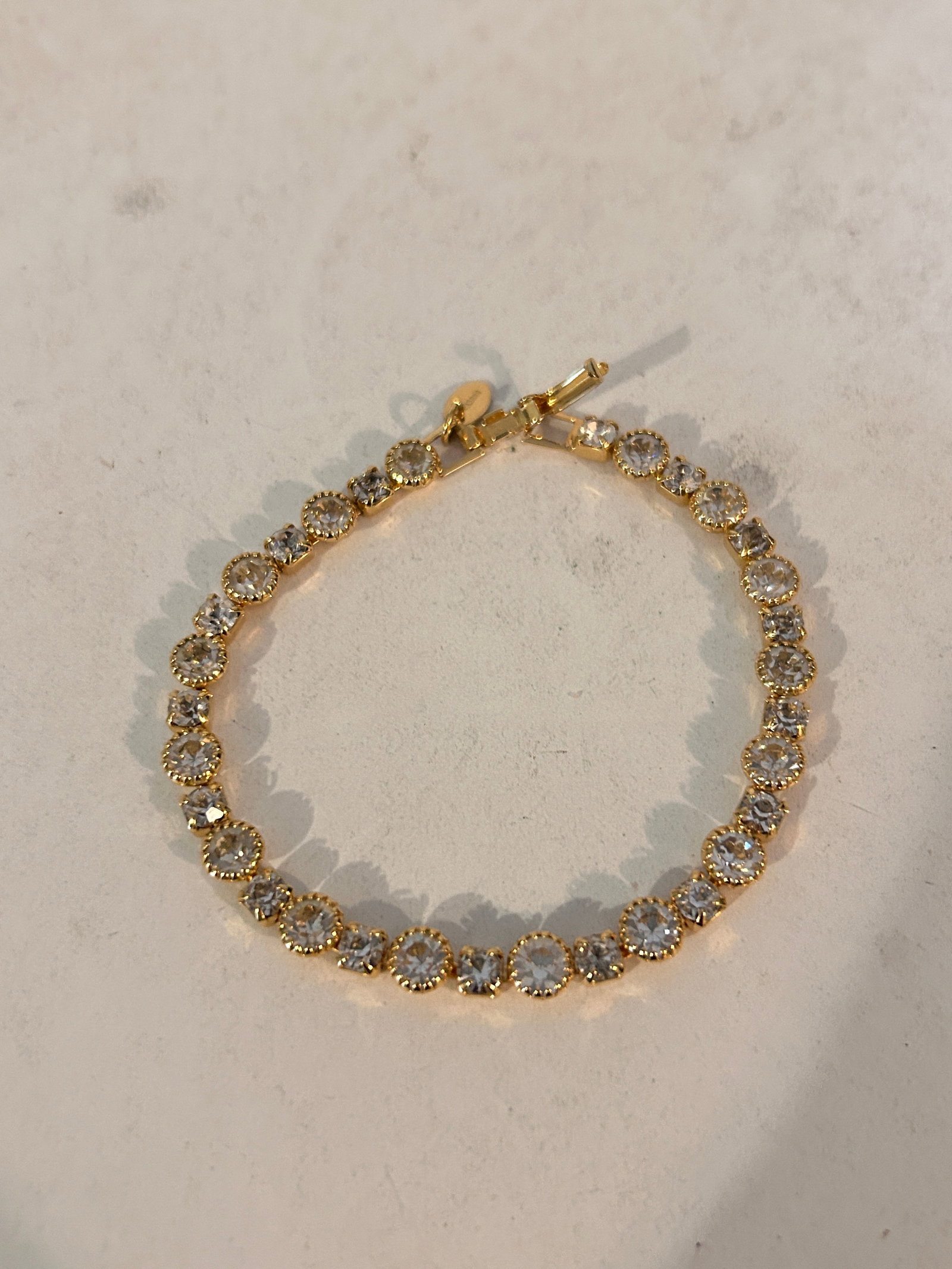 Vintage Oksana Goldtone Rhinestone Bracelet 7": Vintage Oksana Goldtone Rhinestone Bracelet 7" Please view all photos as they are part of the description and condition of this Item, Feel free to contact me with questions or picture requests! Used I