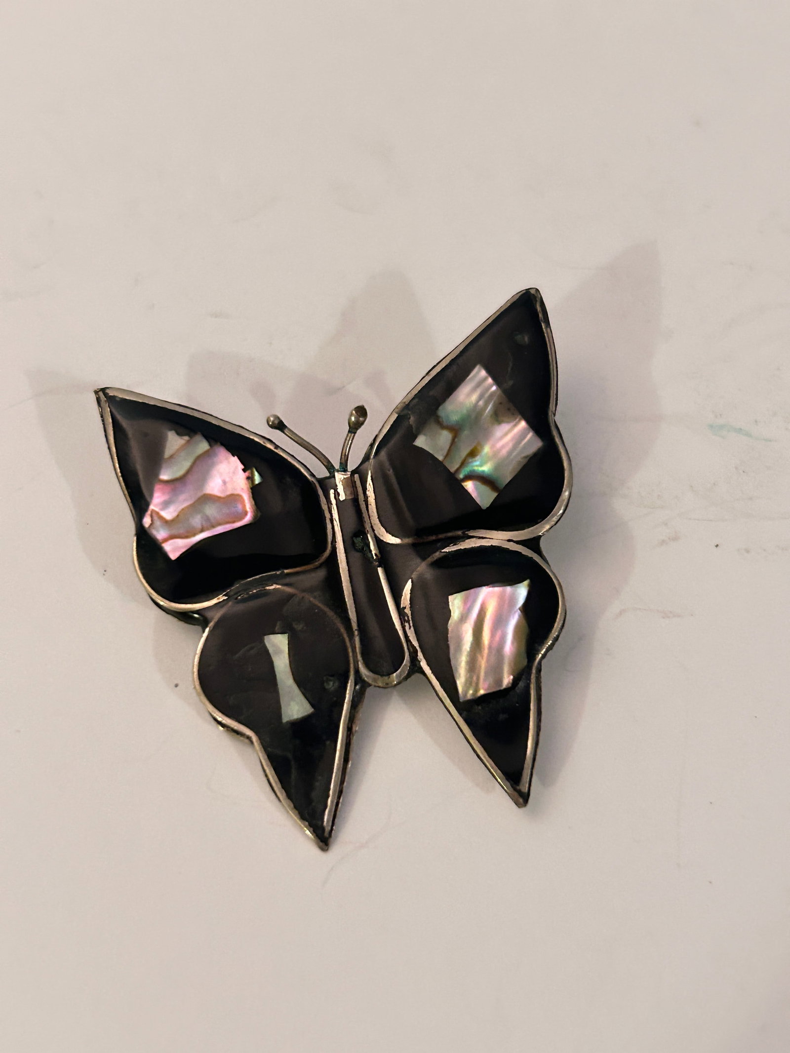 Vintage Mexico Alpaca Butterfly Brooch: Vintage Mexico Alpaca Butterfly Brooch Please view all photos as they are part of the description and condition of this Item, Feel free to contact me with questions or picture requests! Used Item AS I