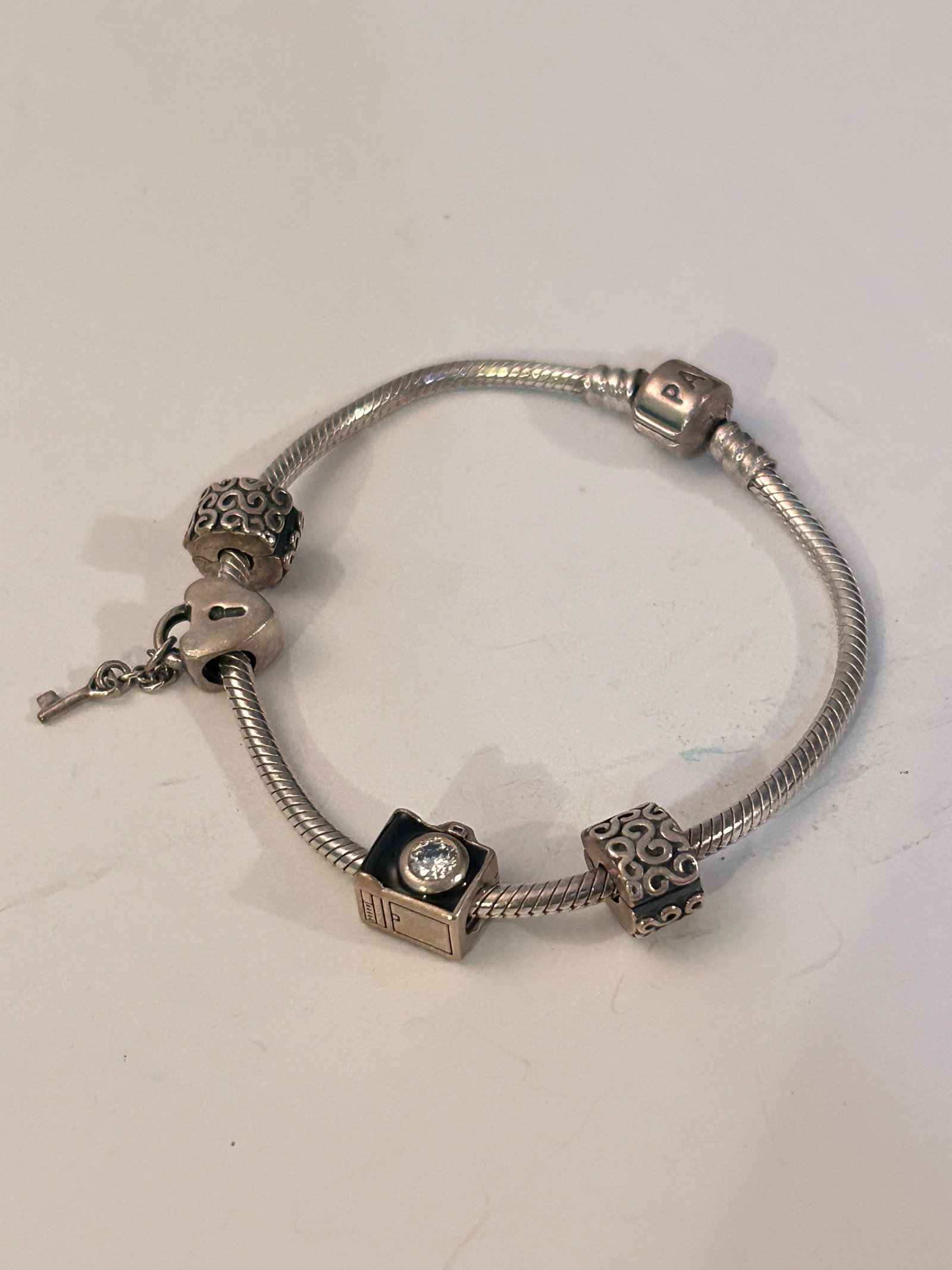 Vintage Sterling Silver Padora Charms & Bracelet Sz 7": Vintage Sterling Silver Padora Charms & Bracelet Sz 7" Please view all photos as they are part of the description and condition of this Item, Feel free to contact me with questions or picture requests