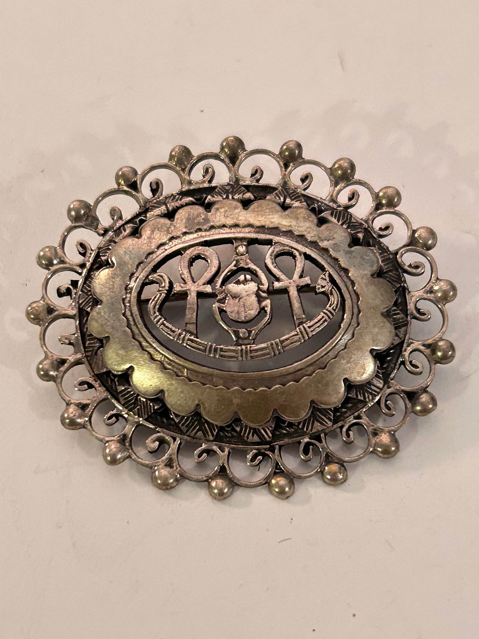 Vintage 1940's Egyptian Motif Brooch Pendant Sterling Silver Filigree 20 grams: Vintage 1940's Egyptian Motif Brooch Pendant Sterling Silver Filigree 20 grams Please view all photos as they are part of the description and condition of this Item, Feel free to contact me with quest