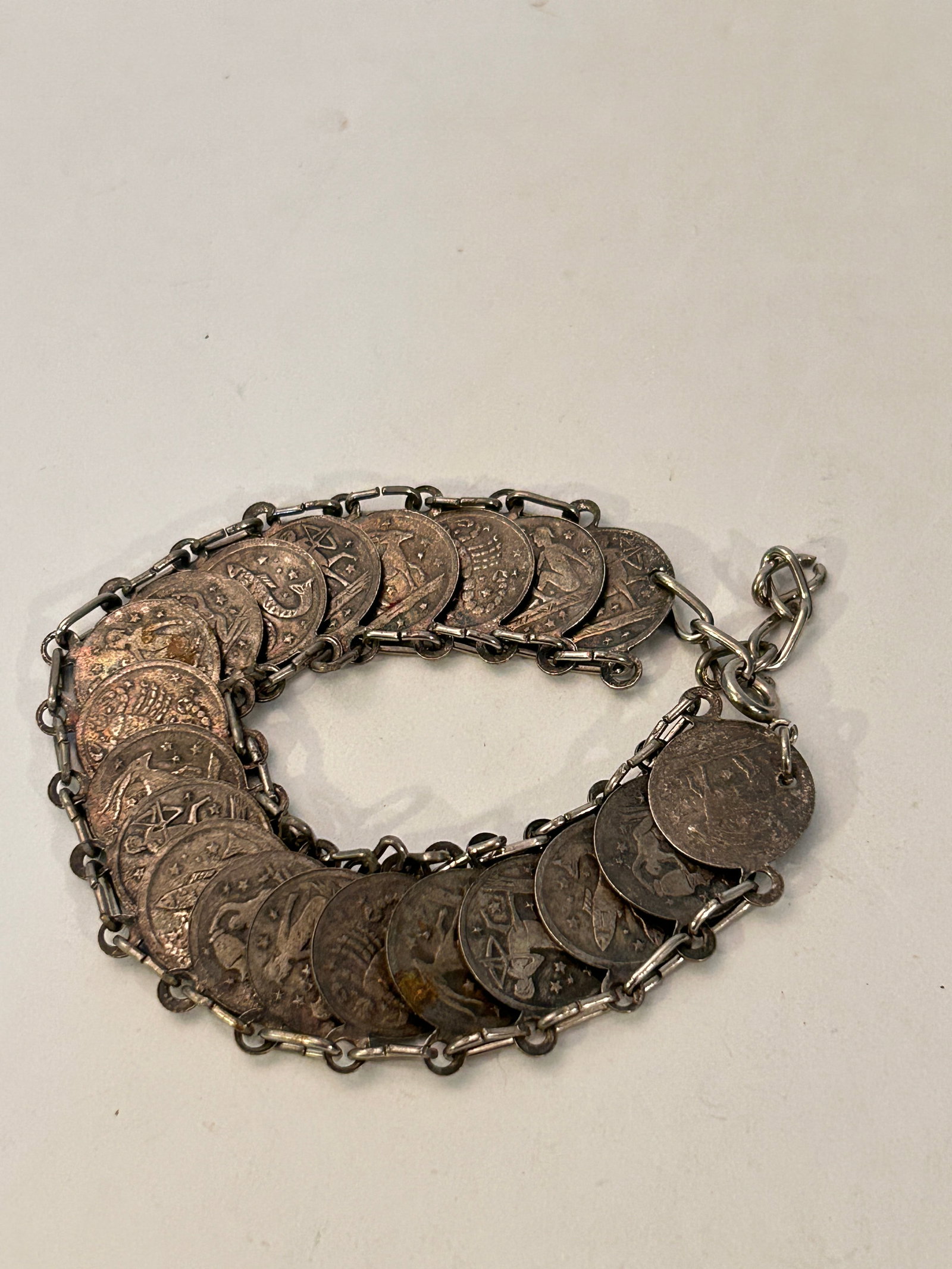 Vintage 1970's Silver Tone Zodiac Coin Bracelet: Vintage 1970's Silver Tone Zodiac Coin Bracelet Please view all photos as they are part of the description and condition of this Item, Feel free to contact me with questions or picture requests! Used 