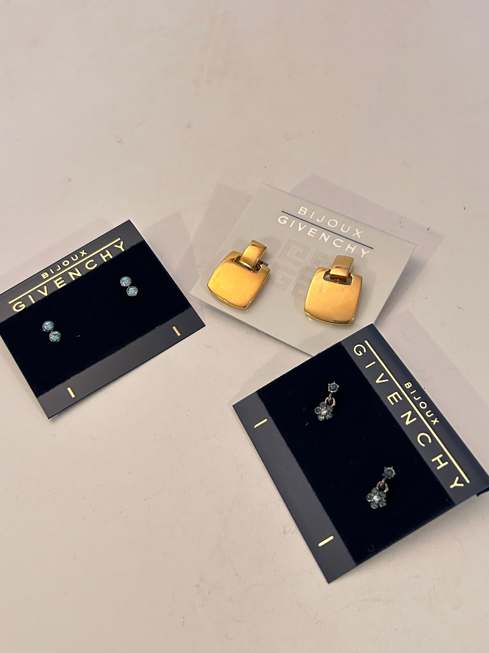 Vintage lot of 3 Givenchy Earrings: Vintage lot of 3 Givenchy Earrings Please view all photos as they are part of the description and condition of this Item, Feel free to contact me with questions or picture requests! Used Item AS IS