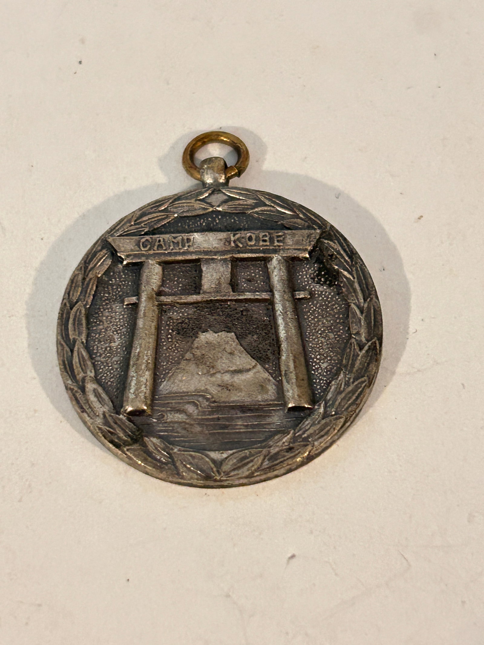 Vintage Tori Gate Camp Kobe Silver Pendant not sterling: Vintage Tori Gate Camp Kobe Silver Pendant not sterling Please view all photos as they are part of the description and condition of this Item, Feel free to contact me with questions or picture request